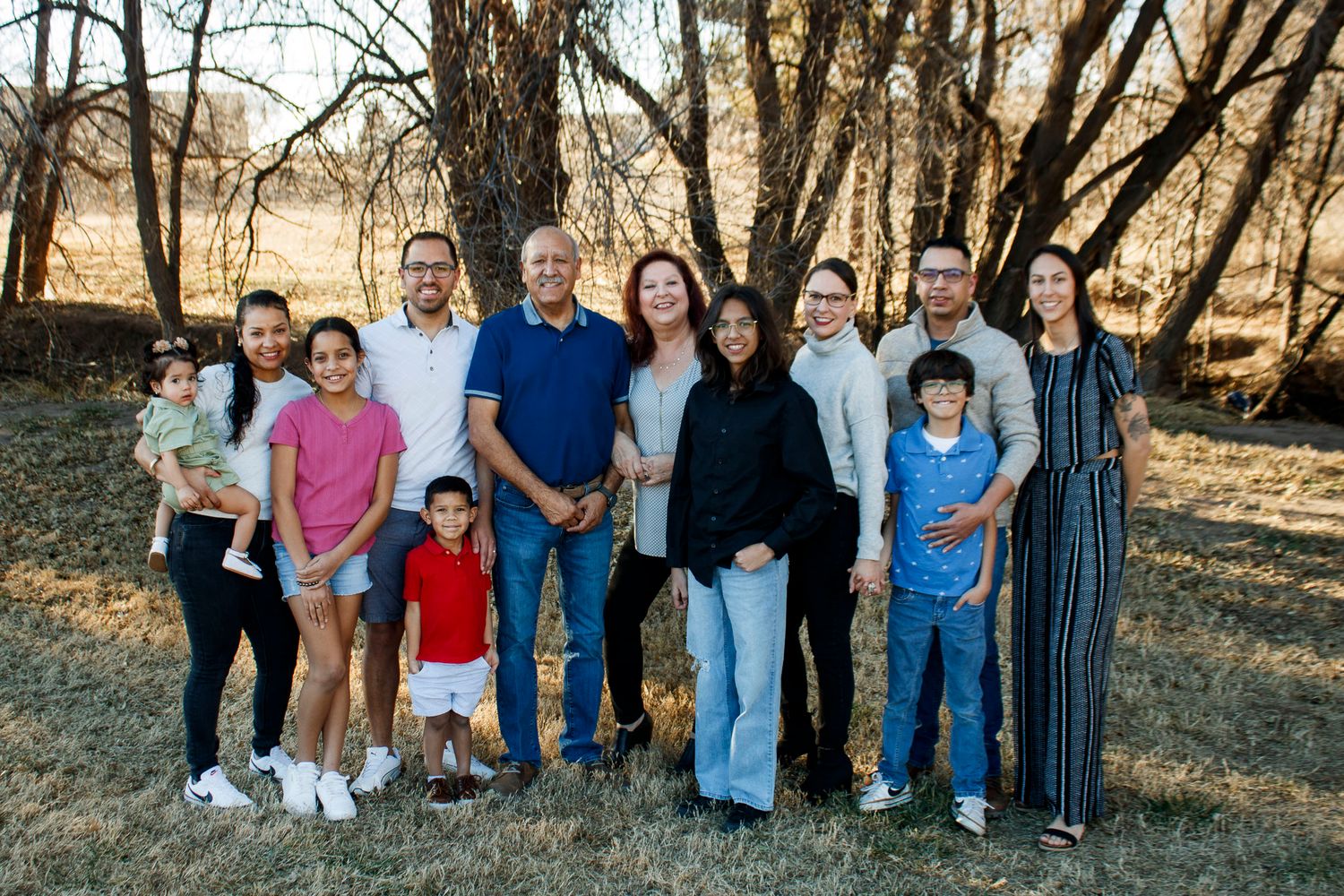 A family of twelve during an extended family photo session at The League House in Amarillo, Texas