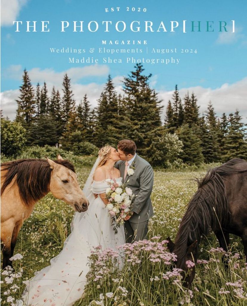 Wedding magazine cover featuring couple with horses in mountain field.