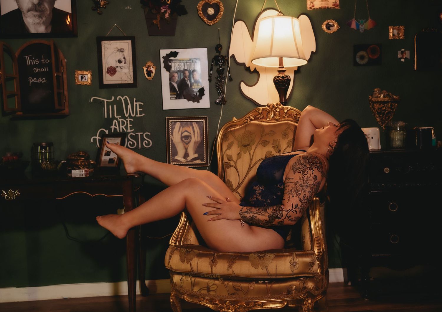 woman sitting in a chair during her boudoir session in brooksville florida near tampa florida in lingerie