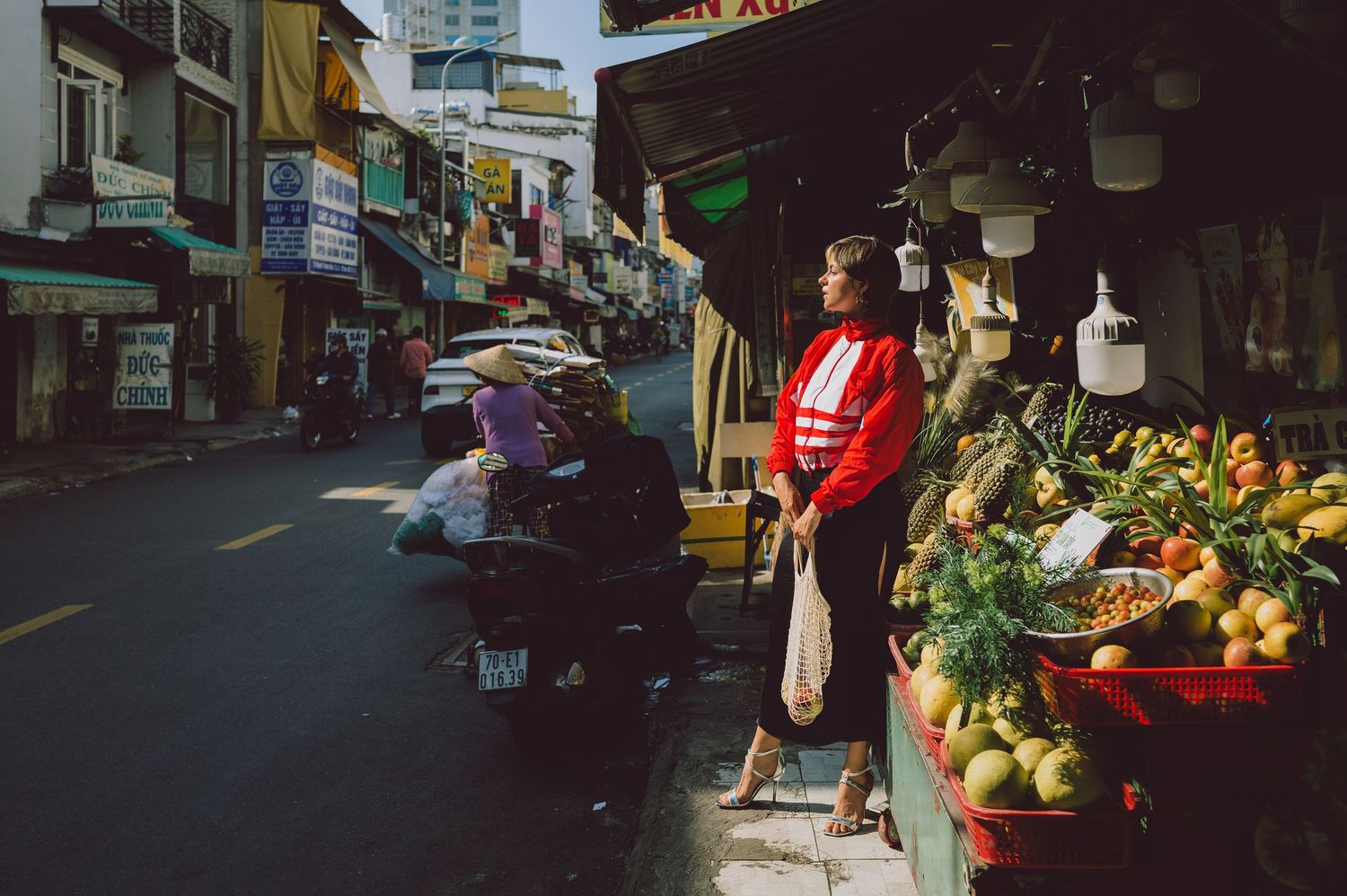Editorial portrait photography at Banana Garden Market, Ho Chi Minh City — street fashion shoot by Anastasia Sokyrka