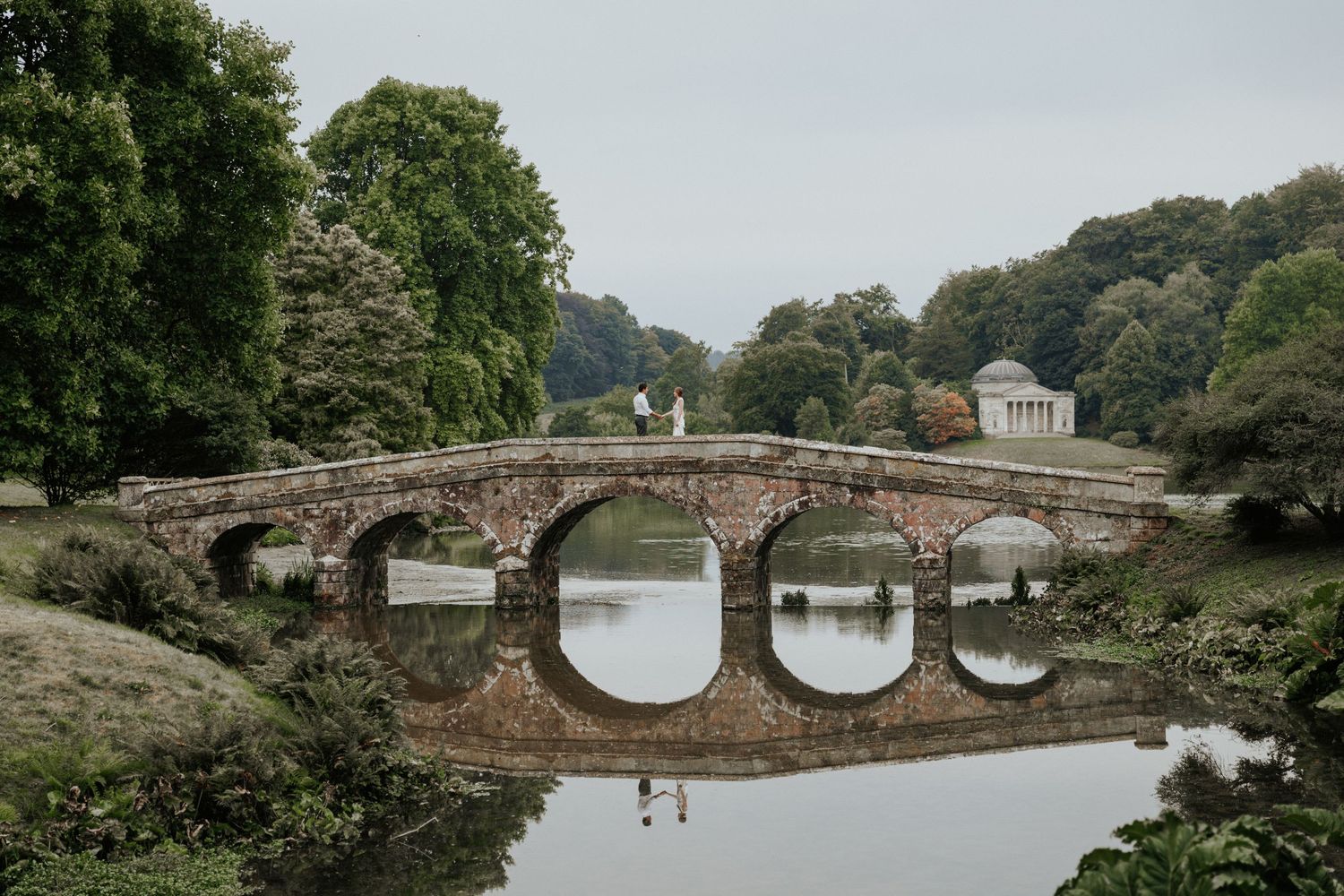 Natural engagement photos at Stourhead National Trust on the Palladian Bridge