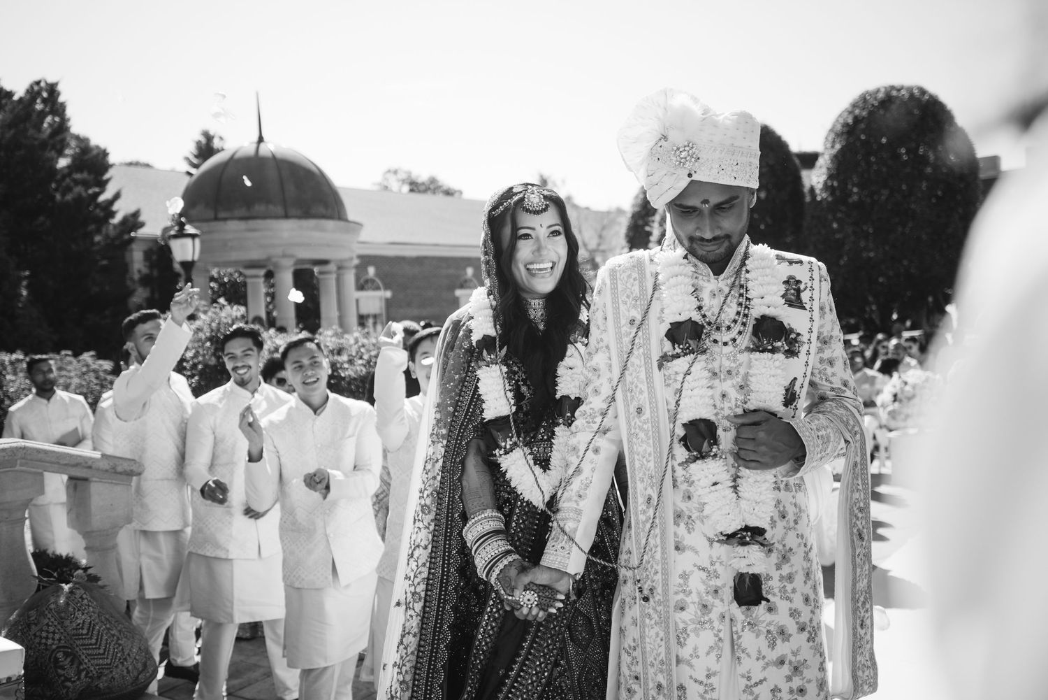A couple in wedding attire circling the mandap at the rockleigh in NJ