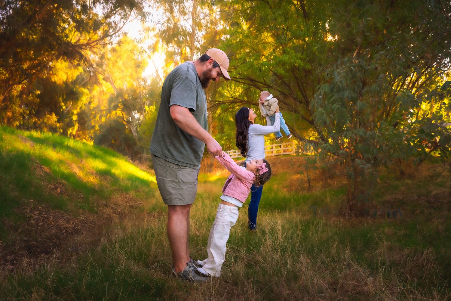 Fresno family photographer capturing joyful fall family portraits at golden hour in Clovis, CA.