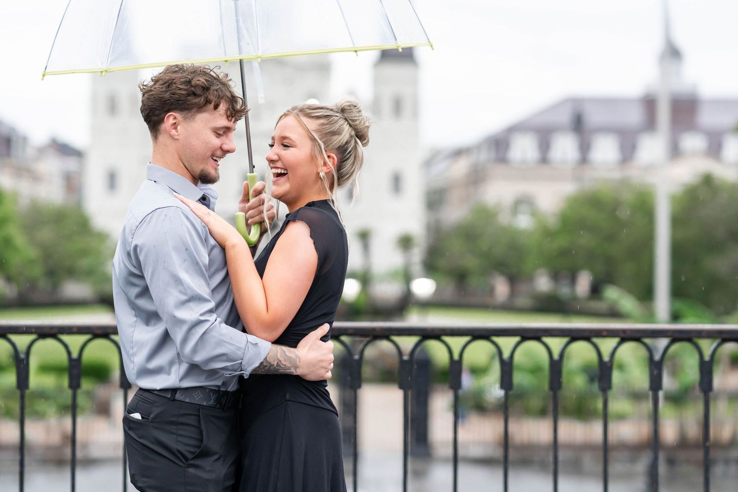 boy and girl just engaged in jackson square in new orleans