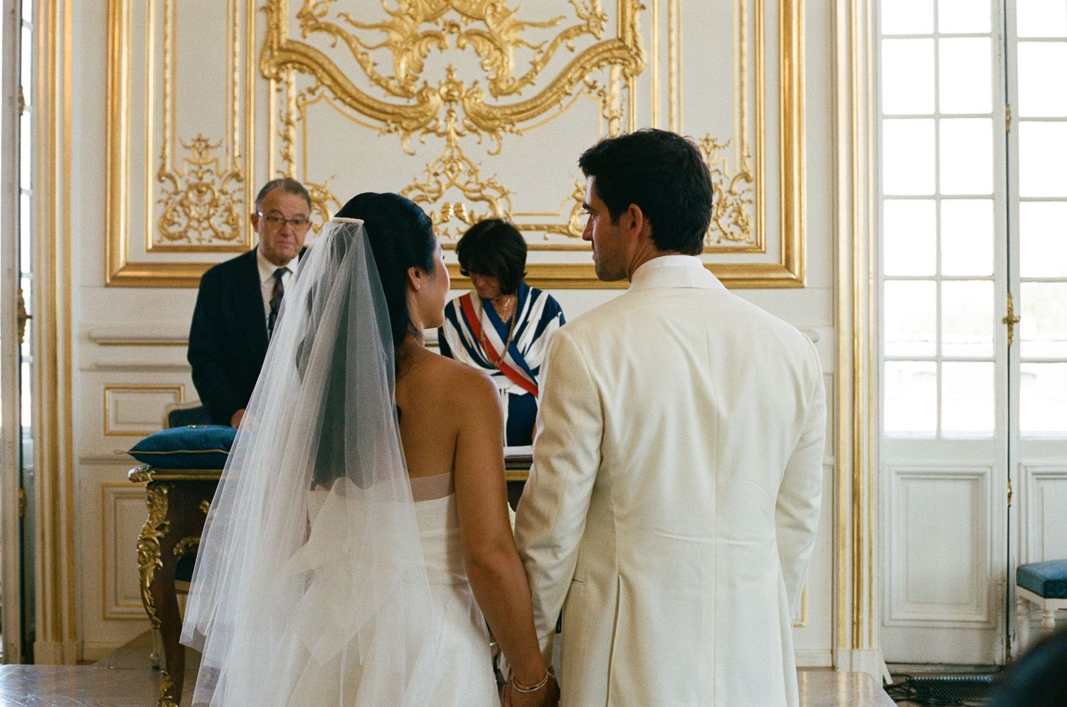 Bride and groom exchange vows at Versailles mairie, Versailles city hall wedding, versailles wedding photographer, film