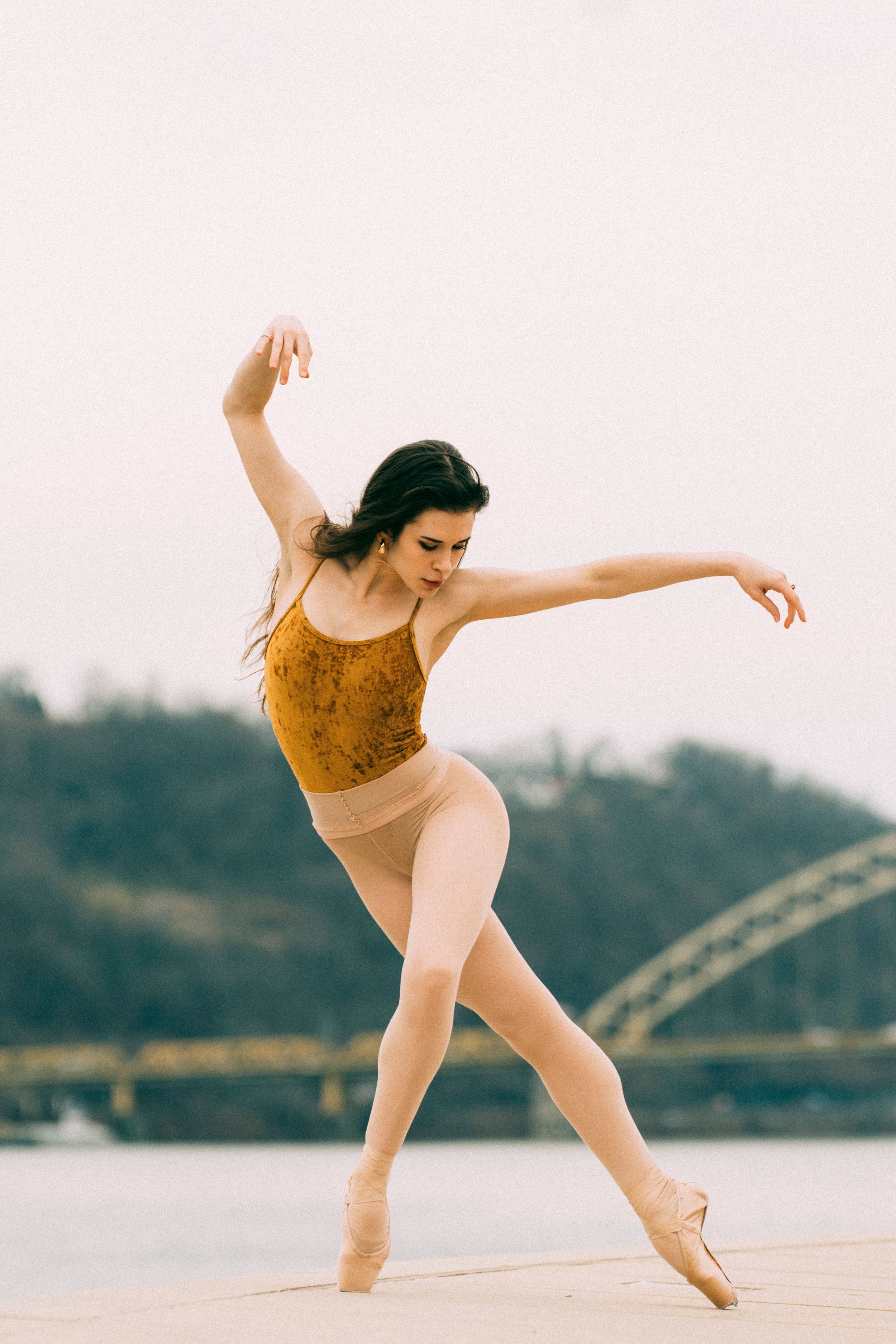 Ballerina striking a graceful pose in Pittsburgh dance photography session.  Pittsburgh Dance Photography