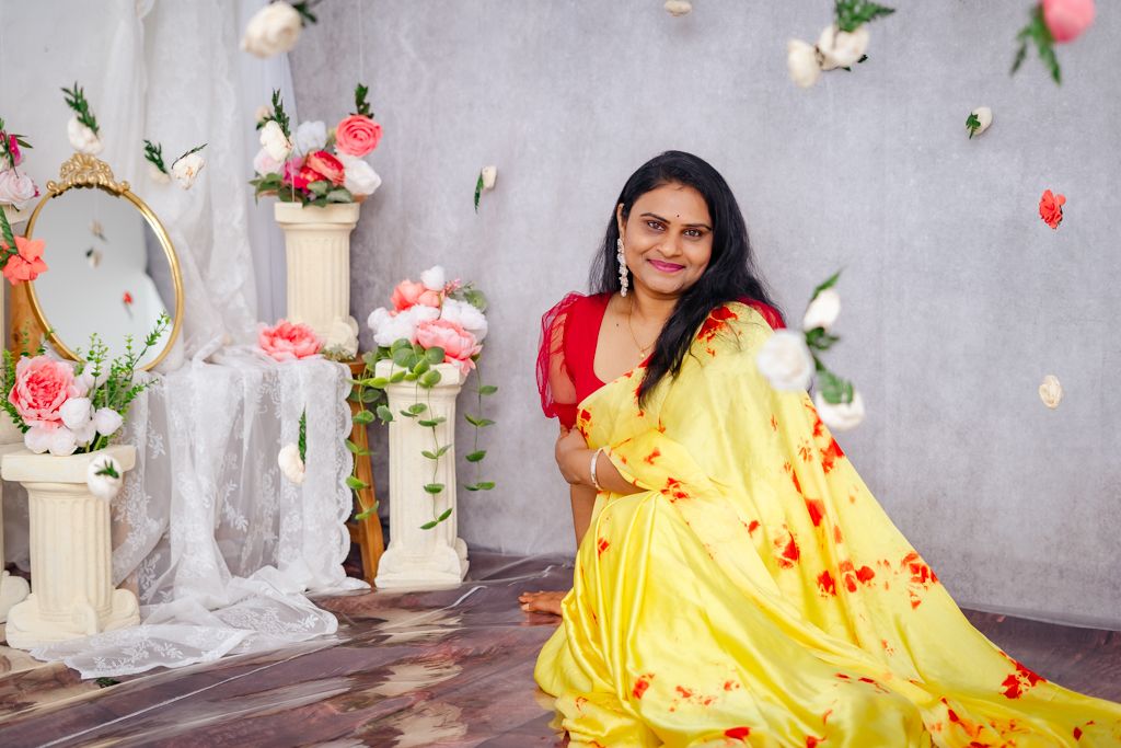 celebrating gorgeous women in a portrait session against dreamy floating floral backdrop