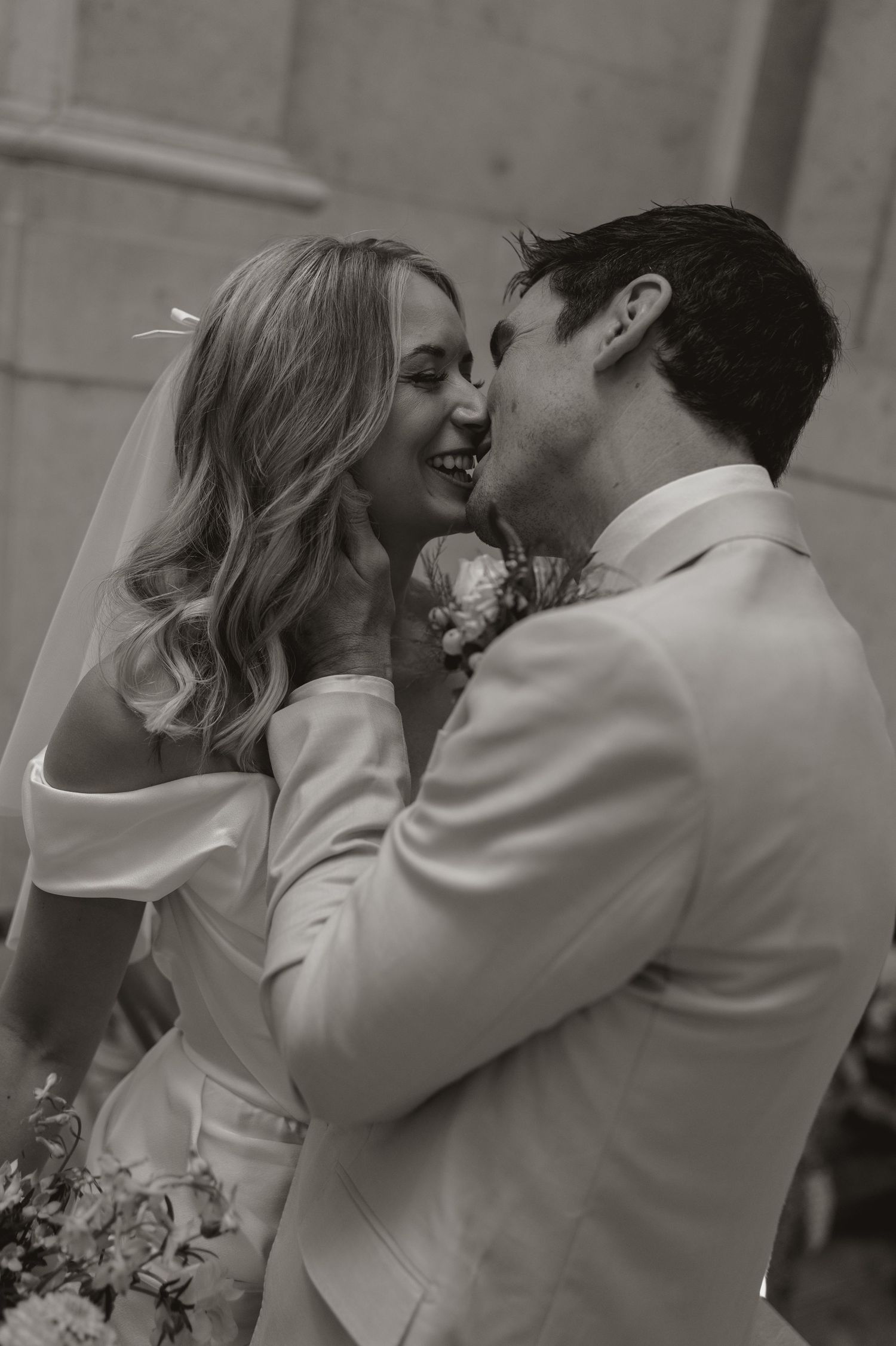 A romantic wedding sequence shows a couple sharing intimate kisses in formal white attire against a neutral backdrop.