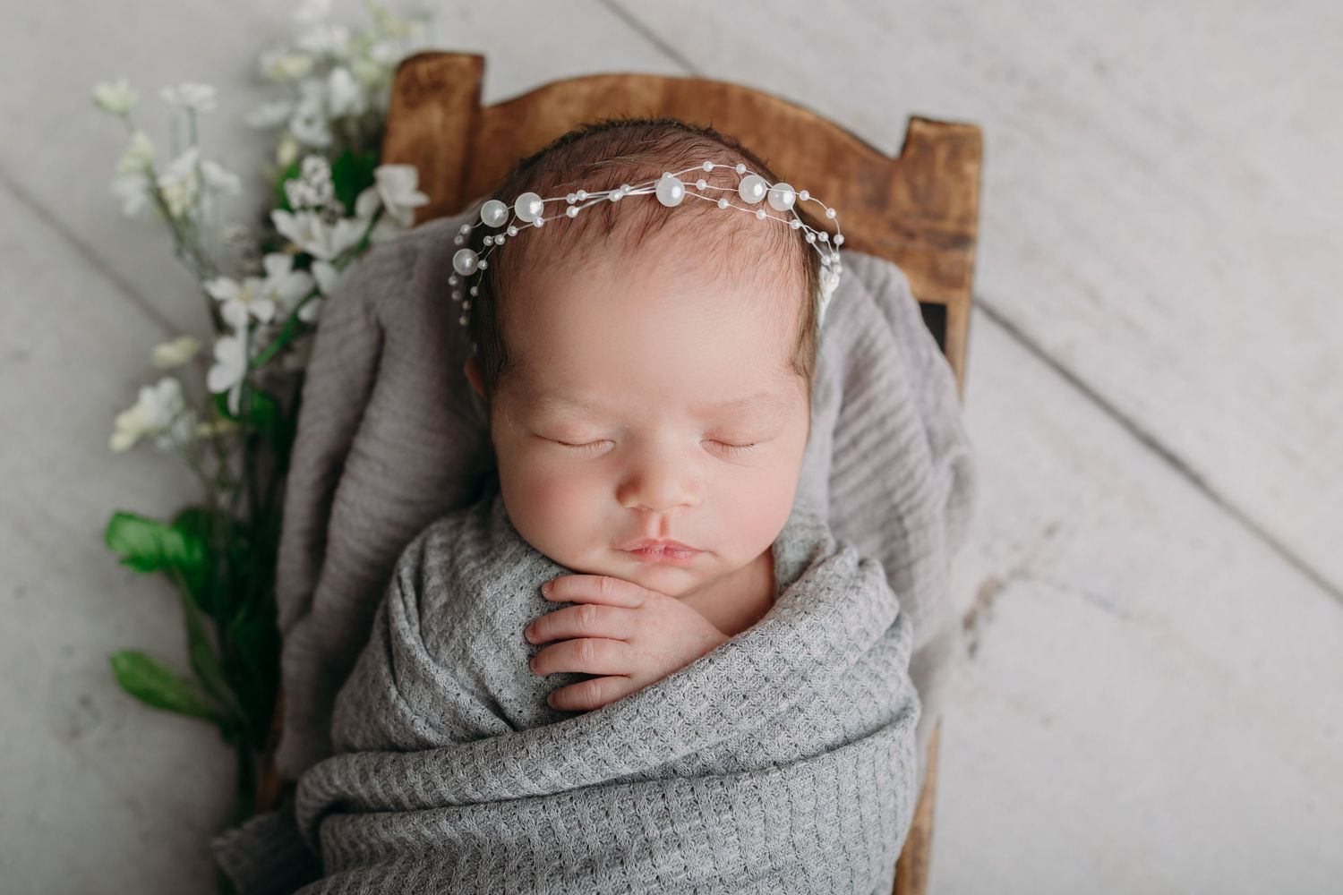 newborn baby girl in light grey - tampa newborn photography session
