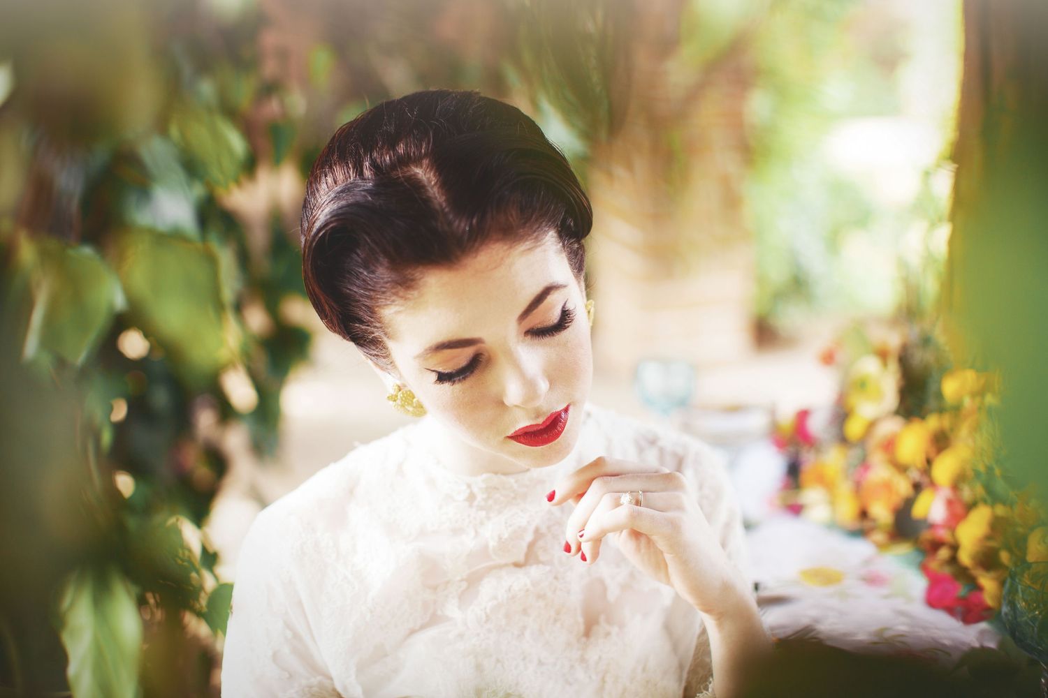 Dreamy garden portrait with soft focus and vintage styling.