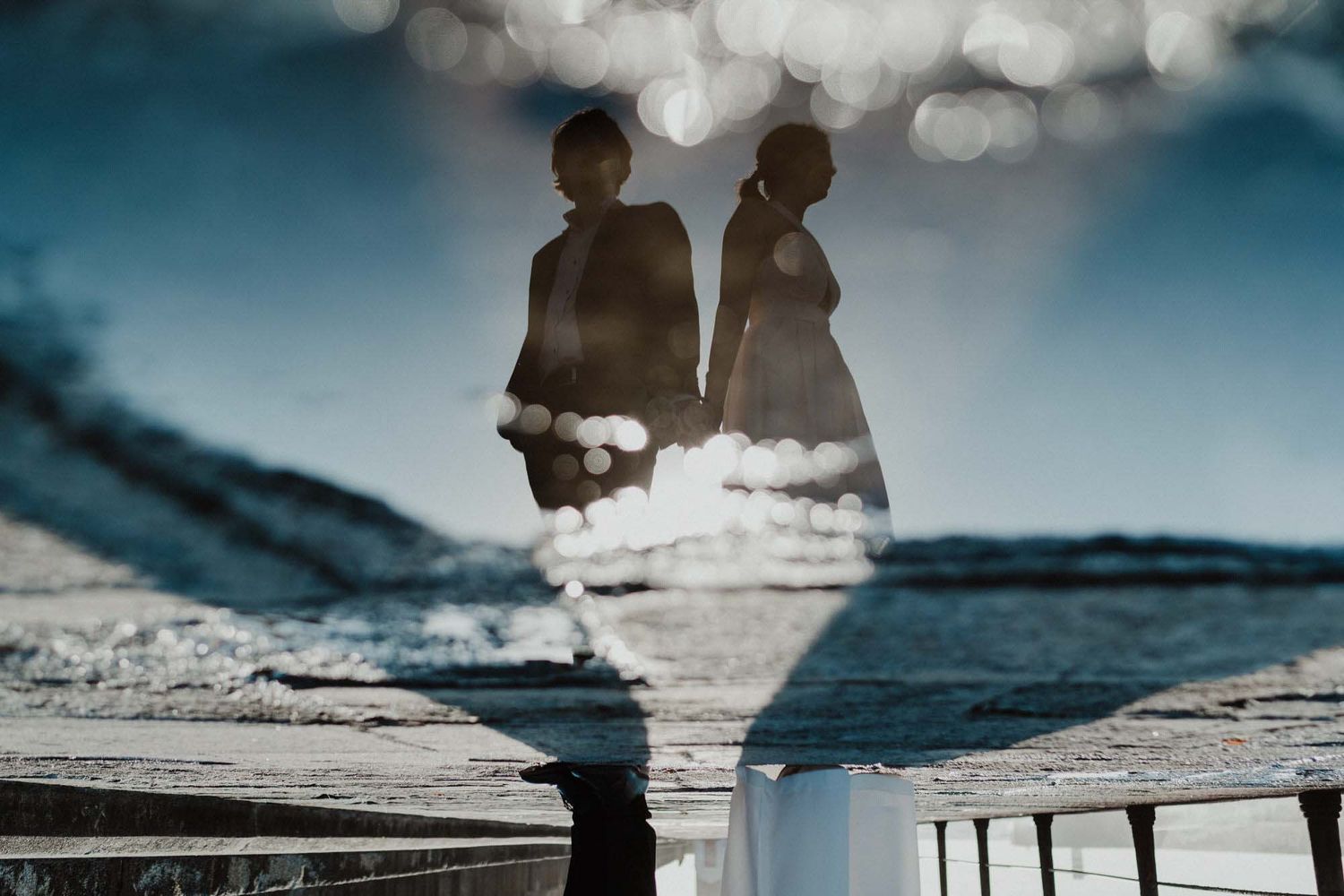 Elopement by the sea in Portugal with moody sunset light