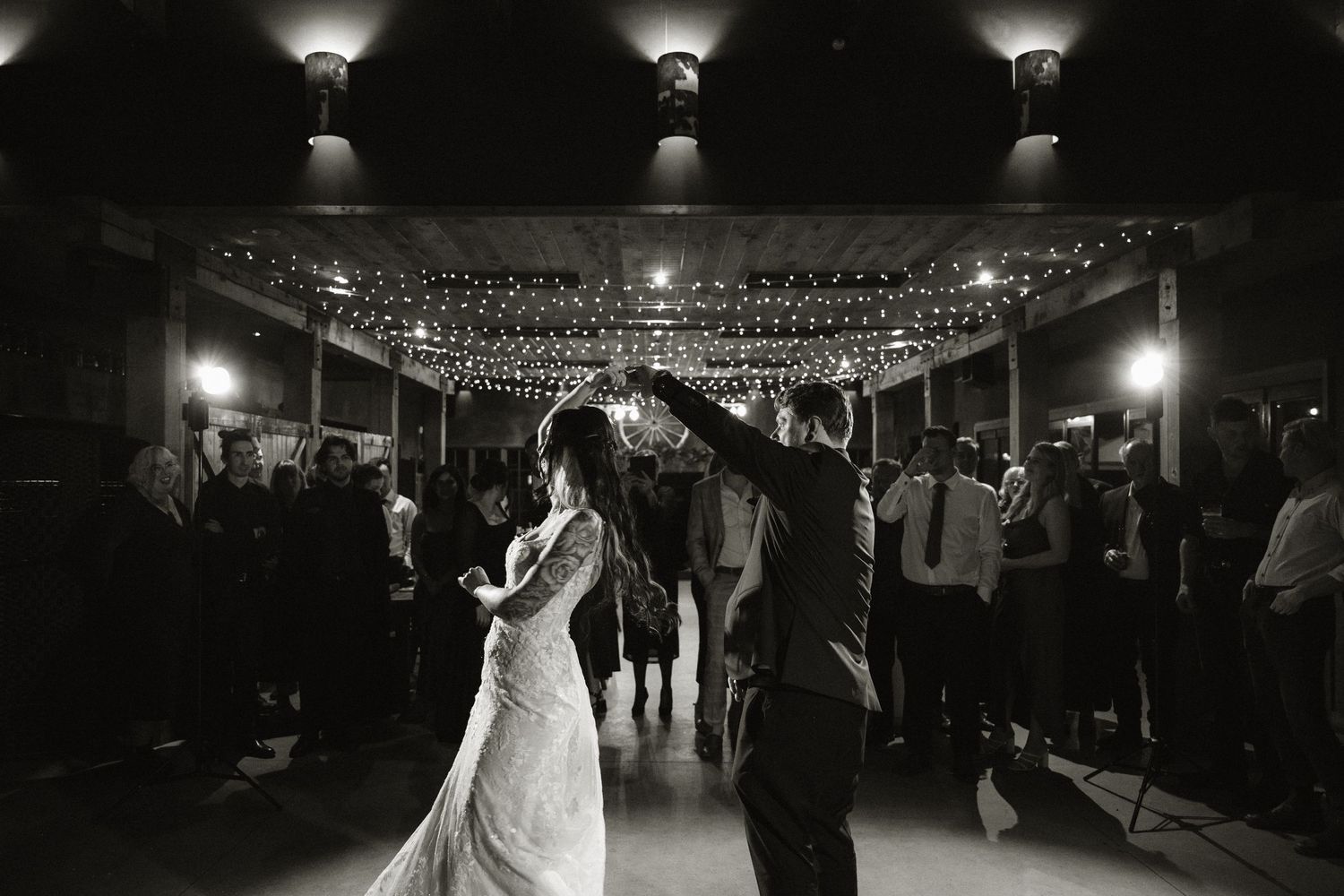 Delicate white veil flows in the breeze during an outdoor wedding ceremony.