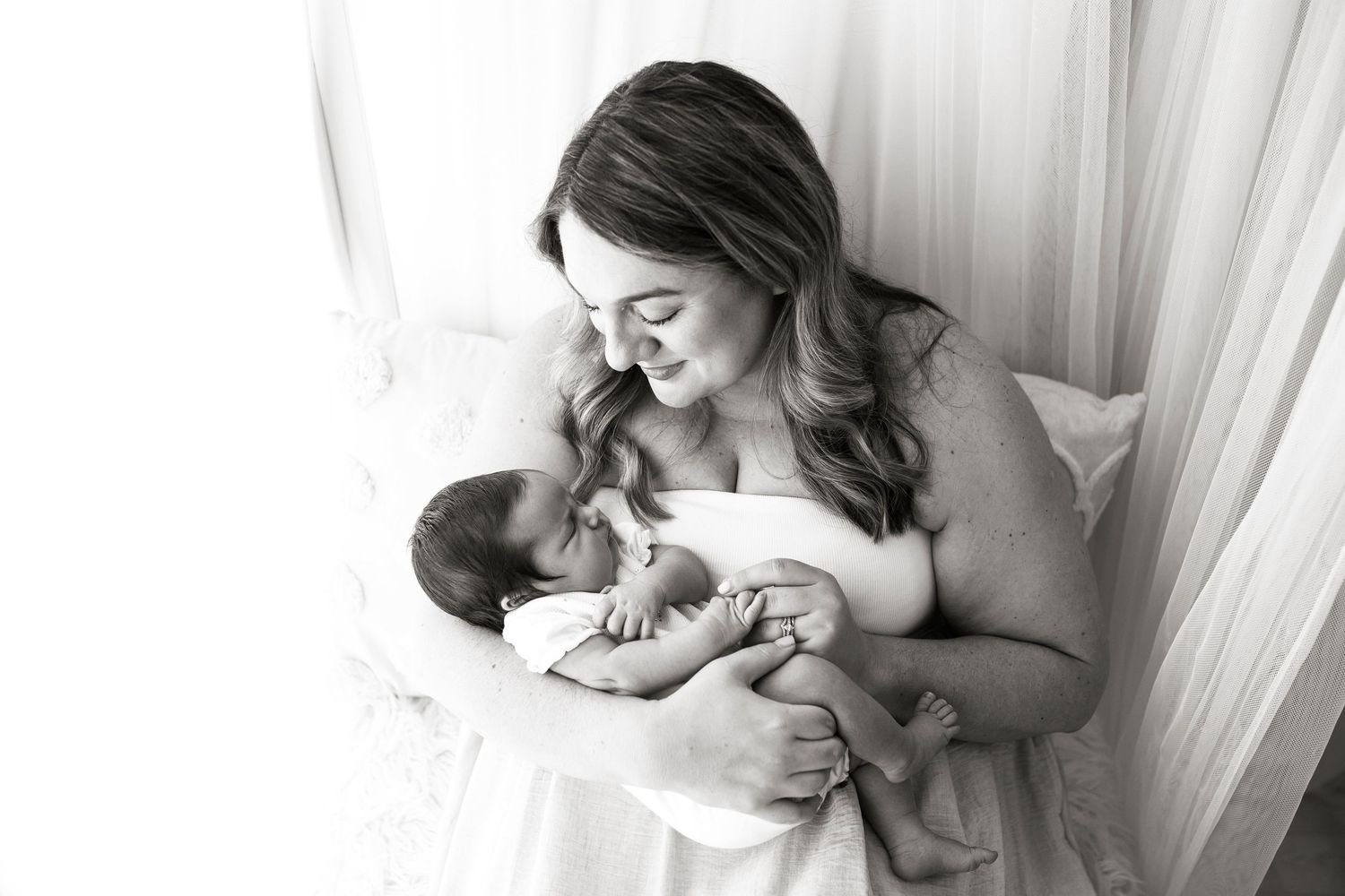 Newborn baby with family by little wonderland photography widnes cheshire