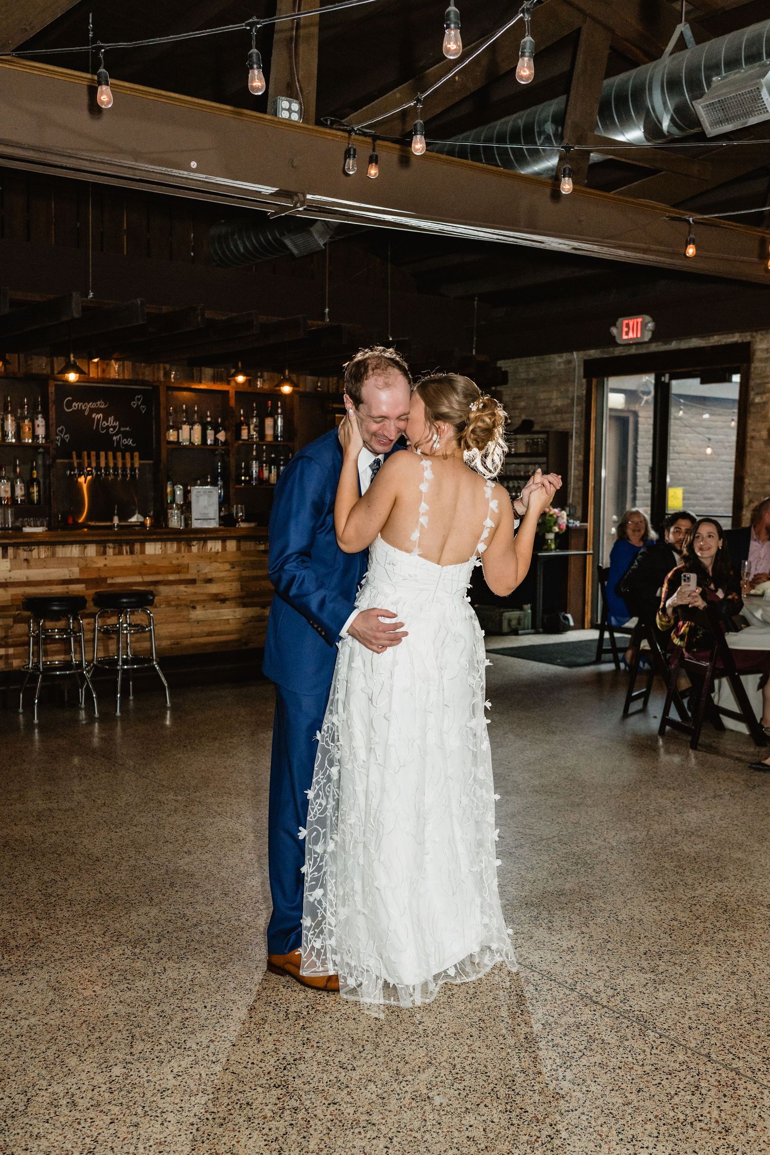 Max and Molly share their first dance as a married couple.