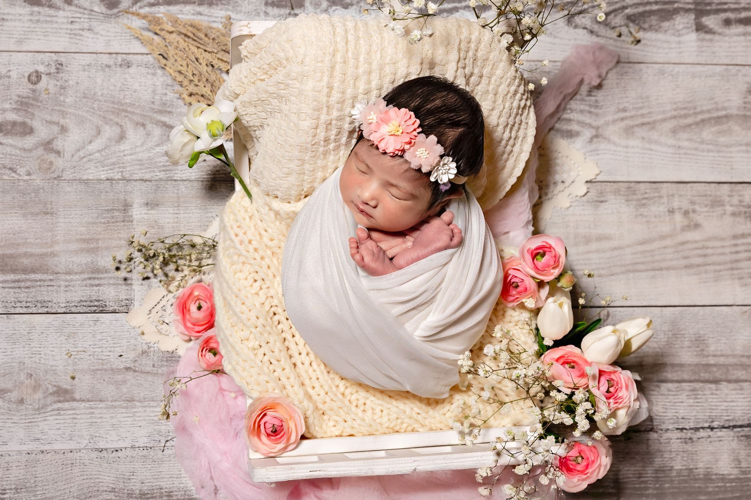Newborn baby Girl captured in custom set up designed and captured by Fresno, Ca photographer.