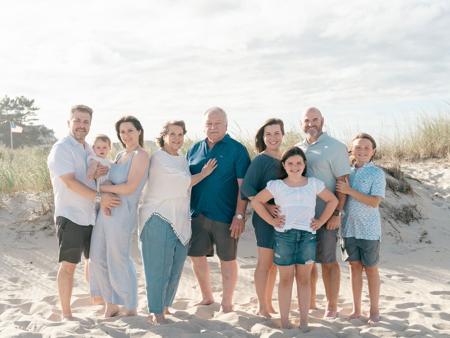 Multi-generational family portraits on the beach in Spring Lake NJ.