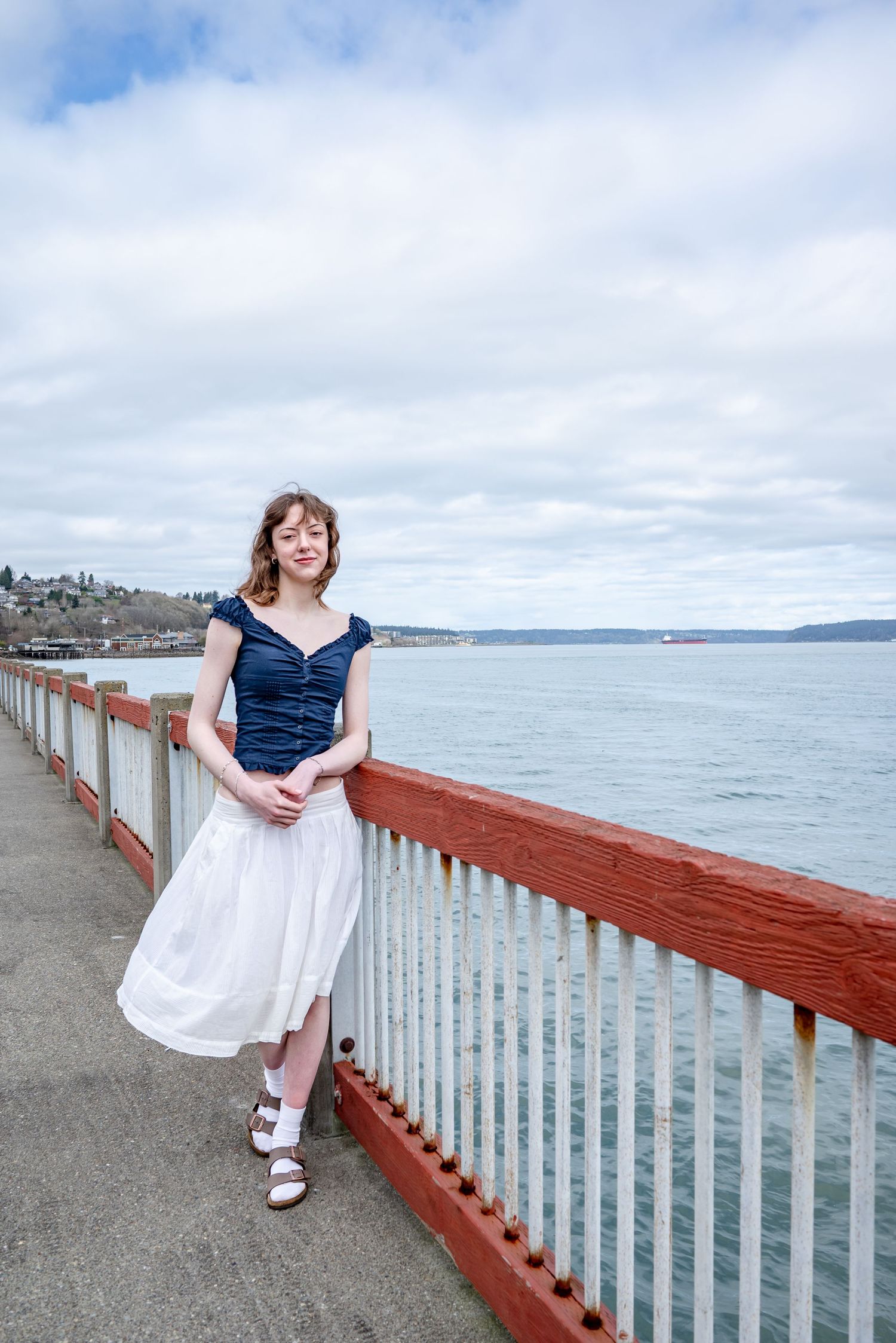 Class of 2026 senior photos at Dickman Mill Park in Tacoma with waterfront views along Commencement Bay