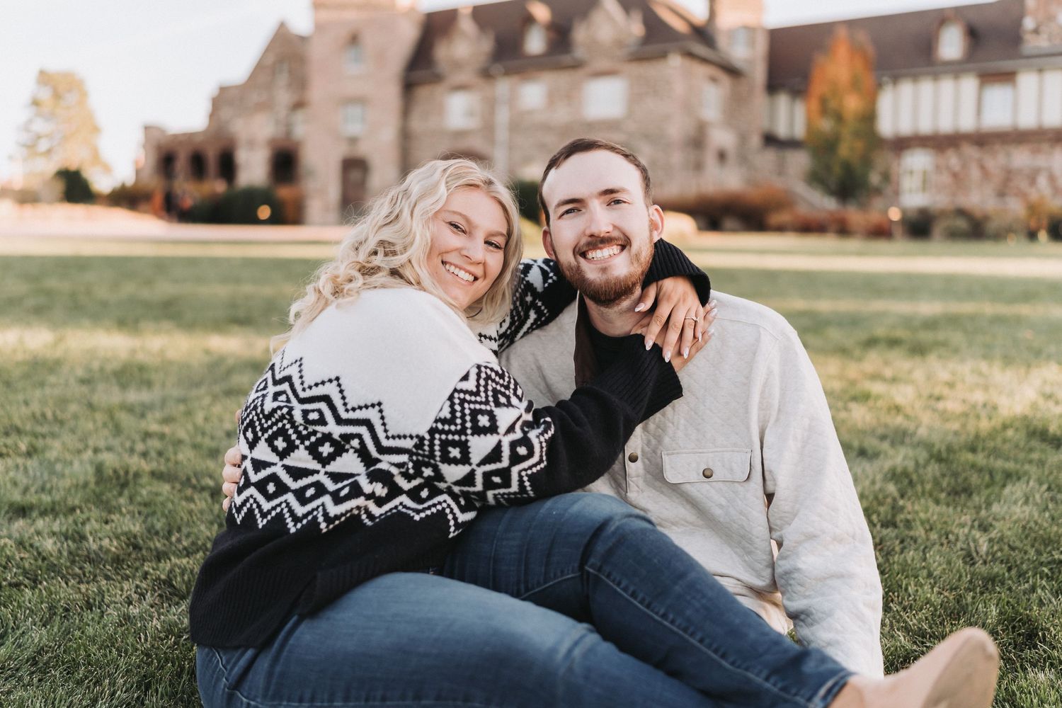 Romantic engagement portrait of Christina and Tanner with Highlands Ranch Mansion in the background