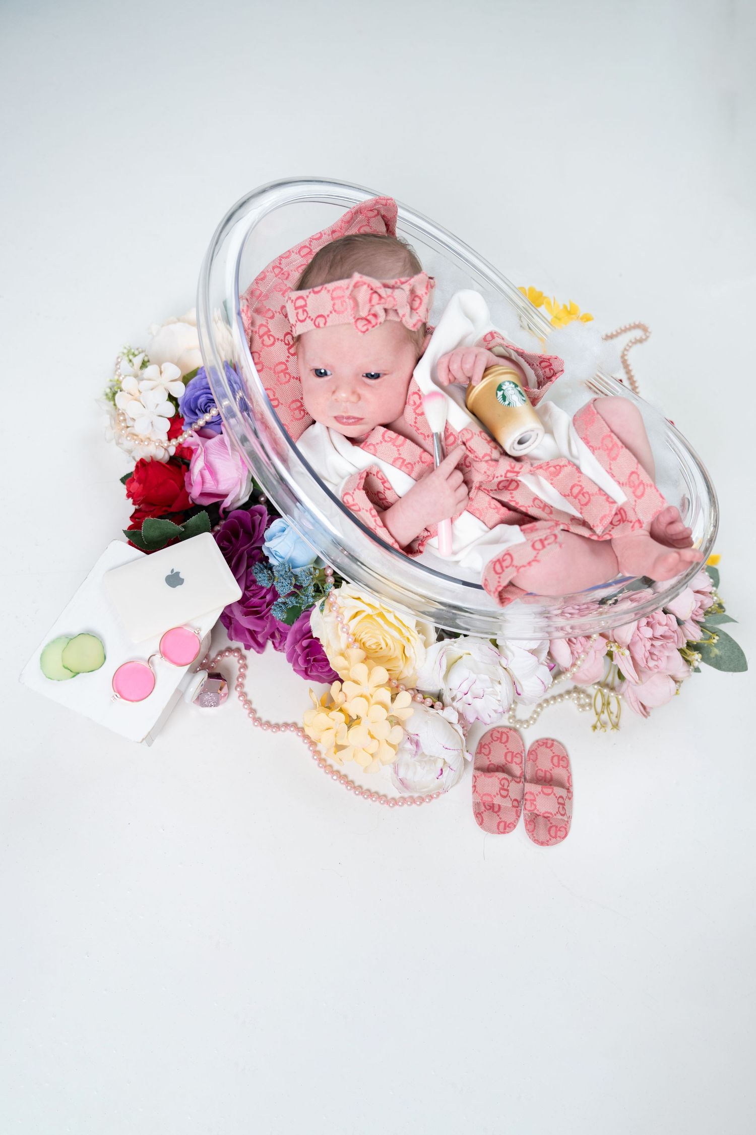 Professional new born photographer Dubai capturing safe and cozy newborn photoshoot in studio