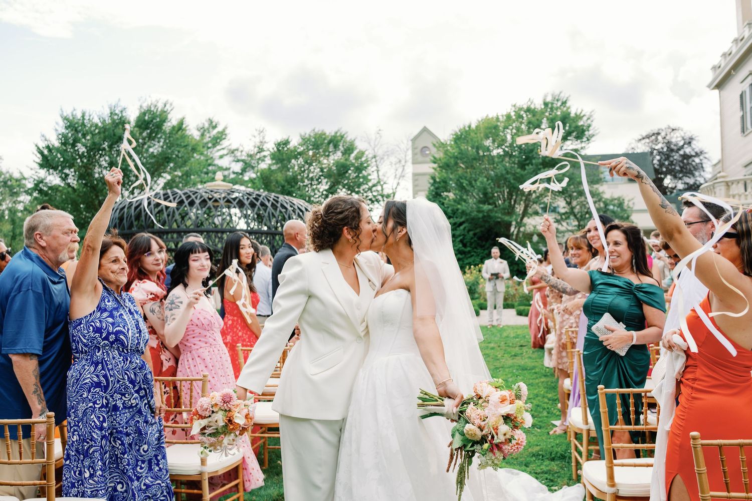 A collage of outdoor wedding ceremony moments showing guests and decorations at an elegant venue.