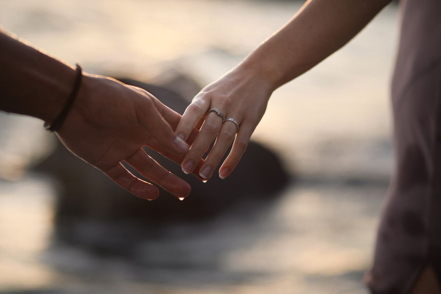 Cinematic Portrait Session can change the way you appreciate yourself and relationship. Couple holding hands. Water drips. Kingston Ontario.