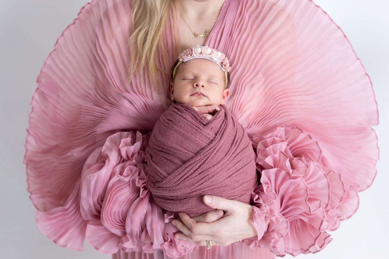 Dubai newborn photography studio photo of a newborn baby girl  mohastudio