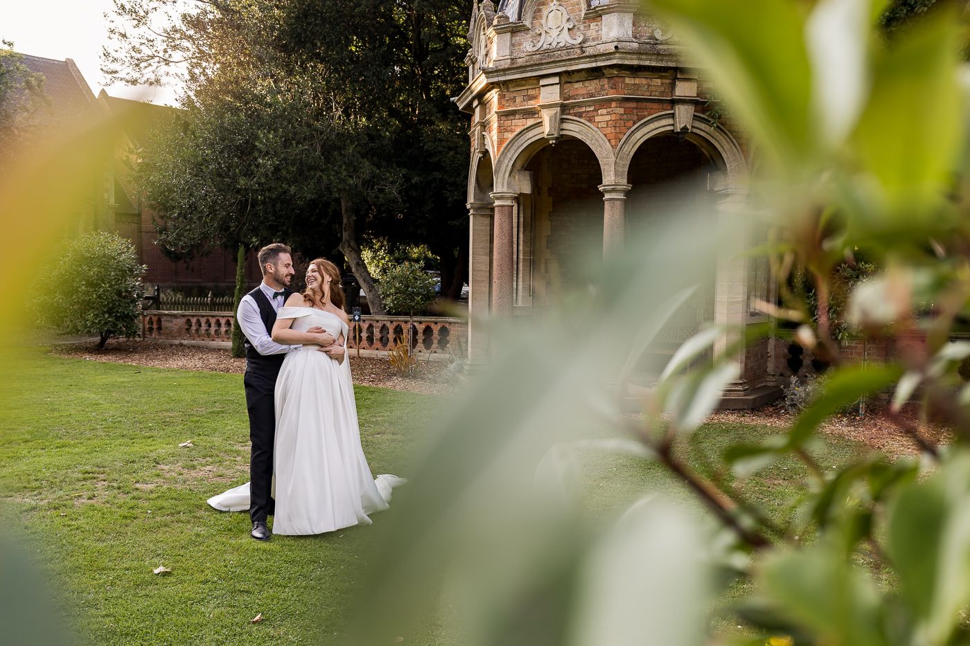 Wedding photo collection featuring couples against historic architecture and garden settings.