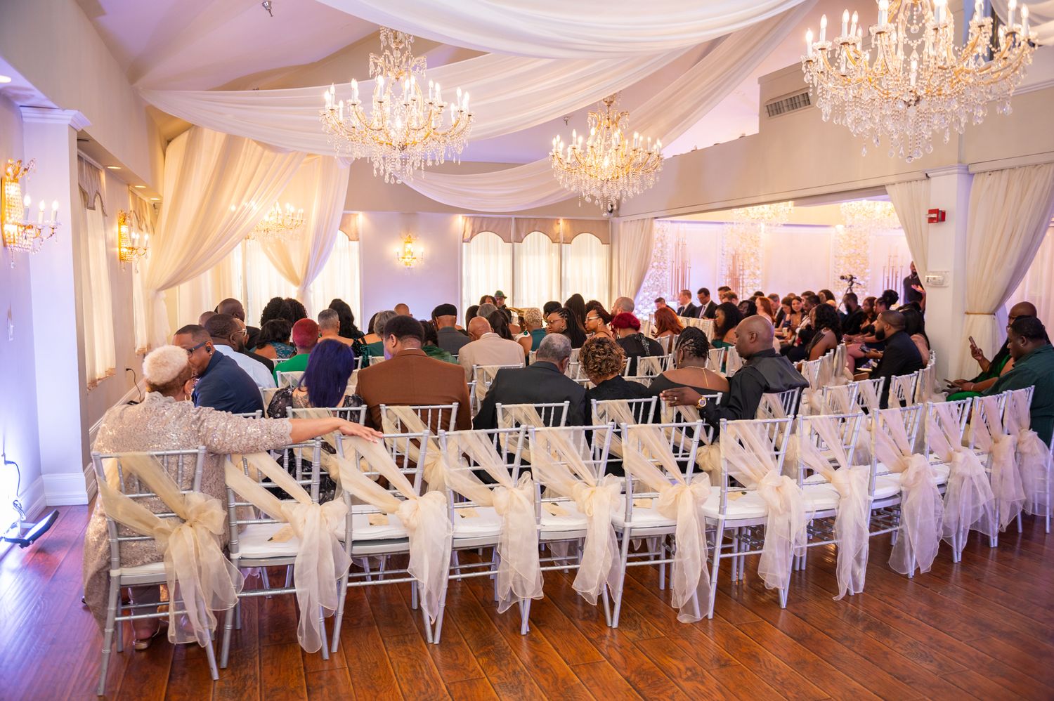 Elegant luxury wedding ceremony at a premier Orlando venue—sunset lighting, floral décor, and timeless romance in Central Florida.