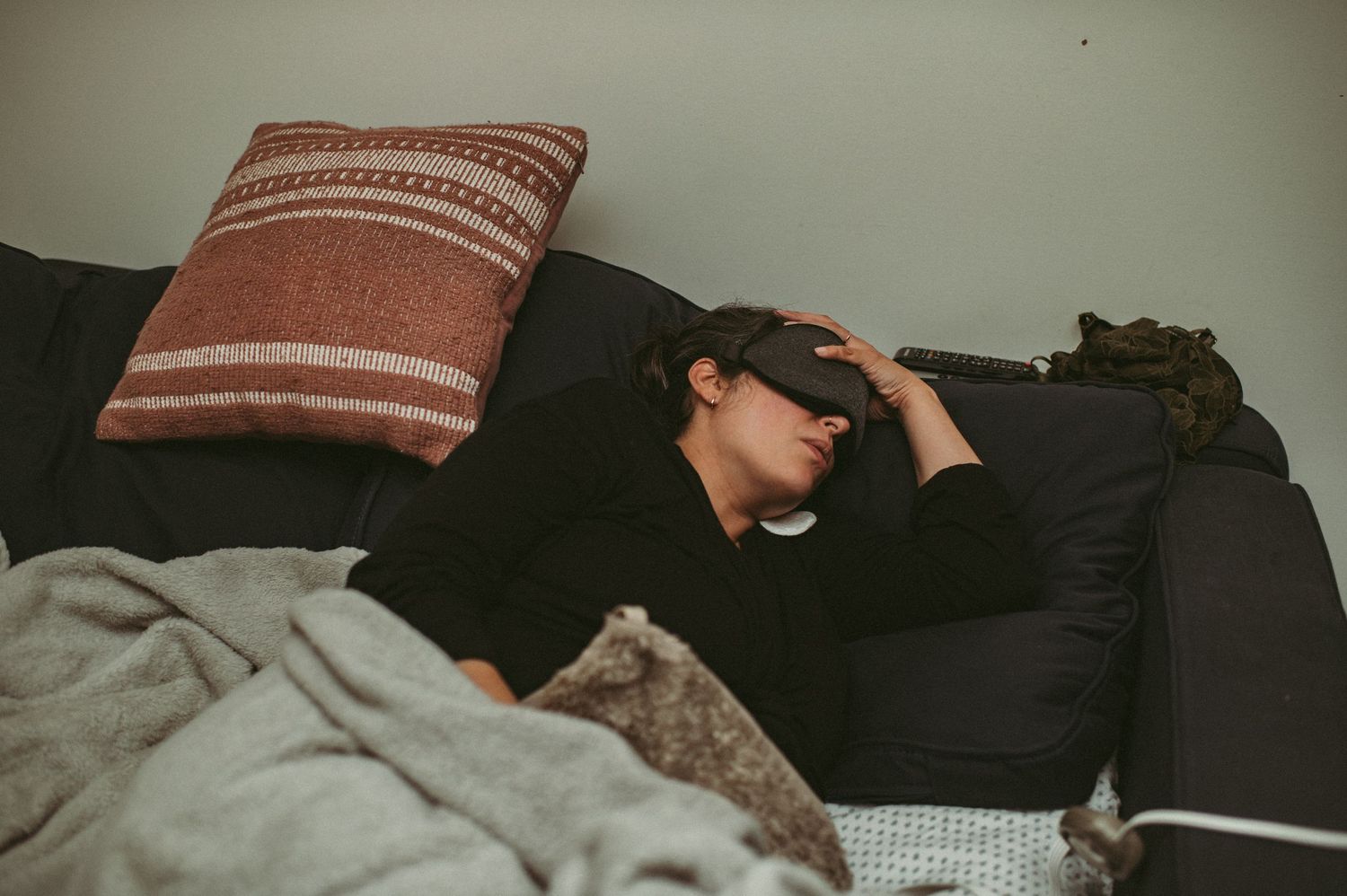 Laboring mom trying to take a moment to rest during a lull in contractions in her home in Hampton, Virginia.