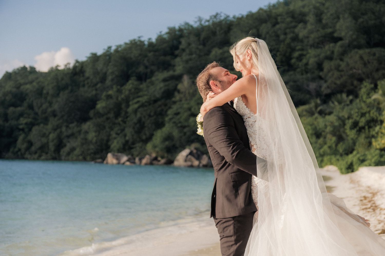 Wedding portraits on Ste Anne Island in Seychelles, photographed on the Club Med beach.