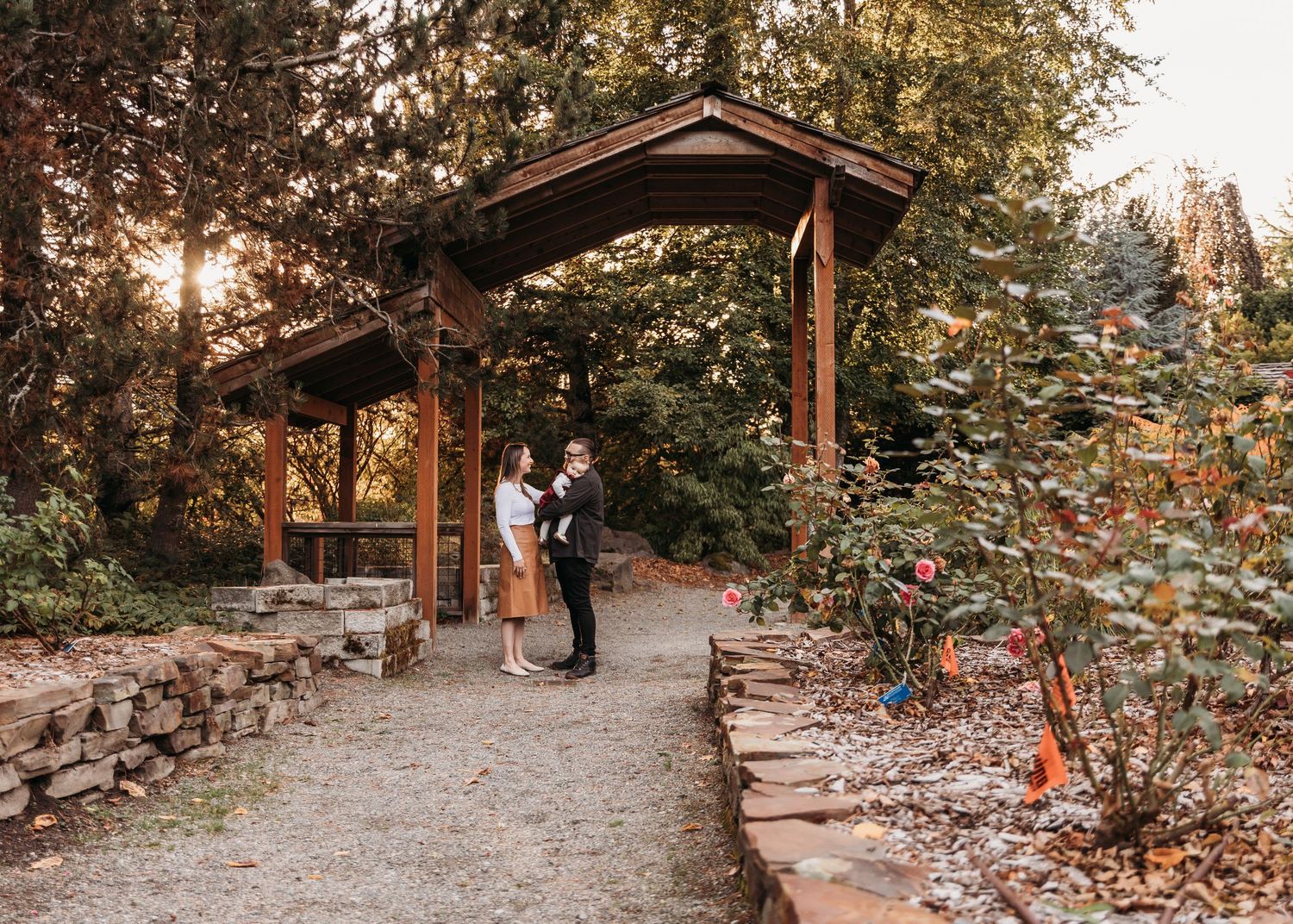 A series of wedding photos in a rustic outdoor venue shows couples and guests celebrating under wooden gazebos at sunset.