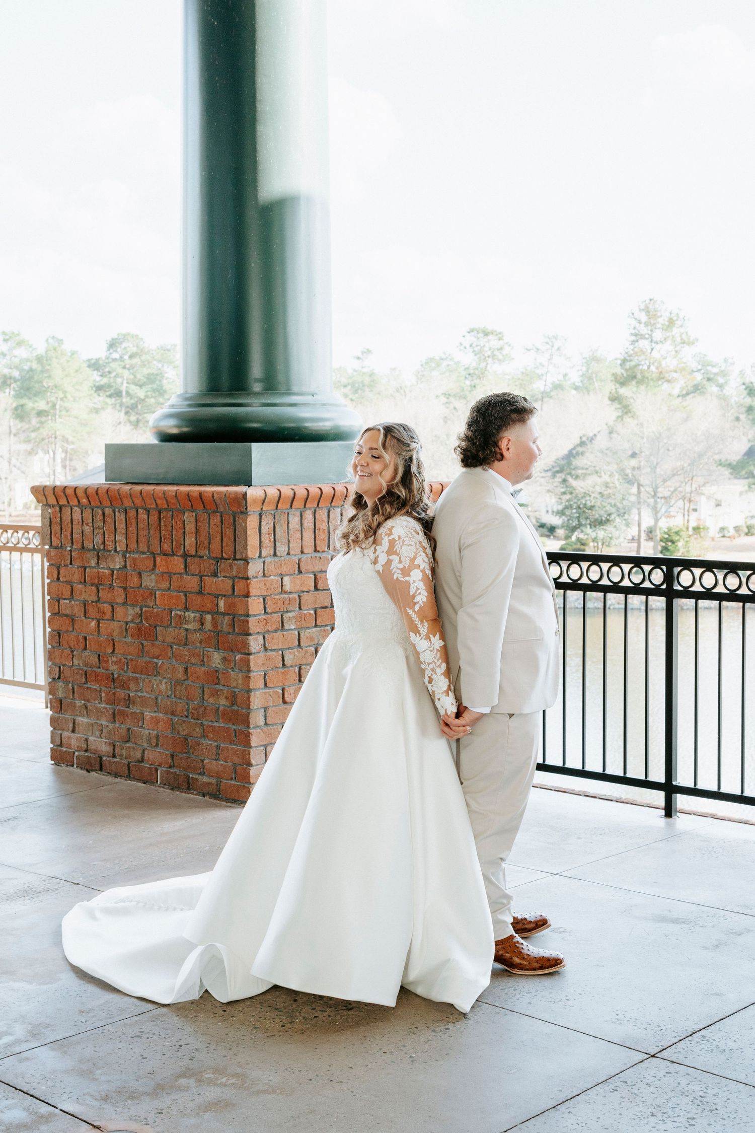 A series of romantic wedding photos showing a couple in white embracing on a covered porch with brick columns.