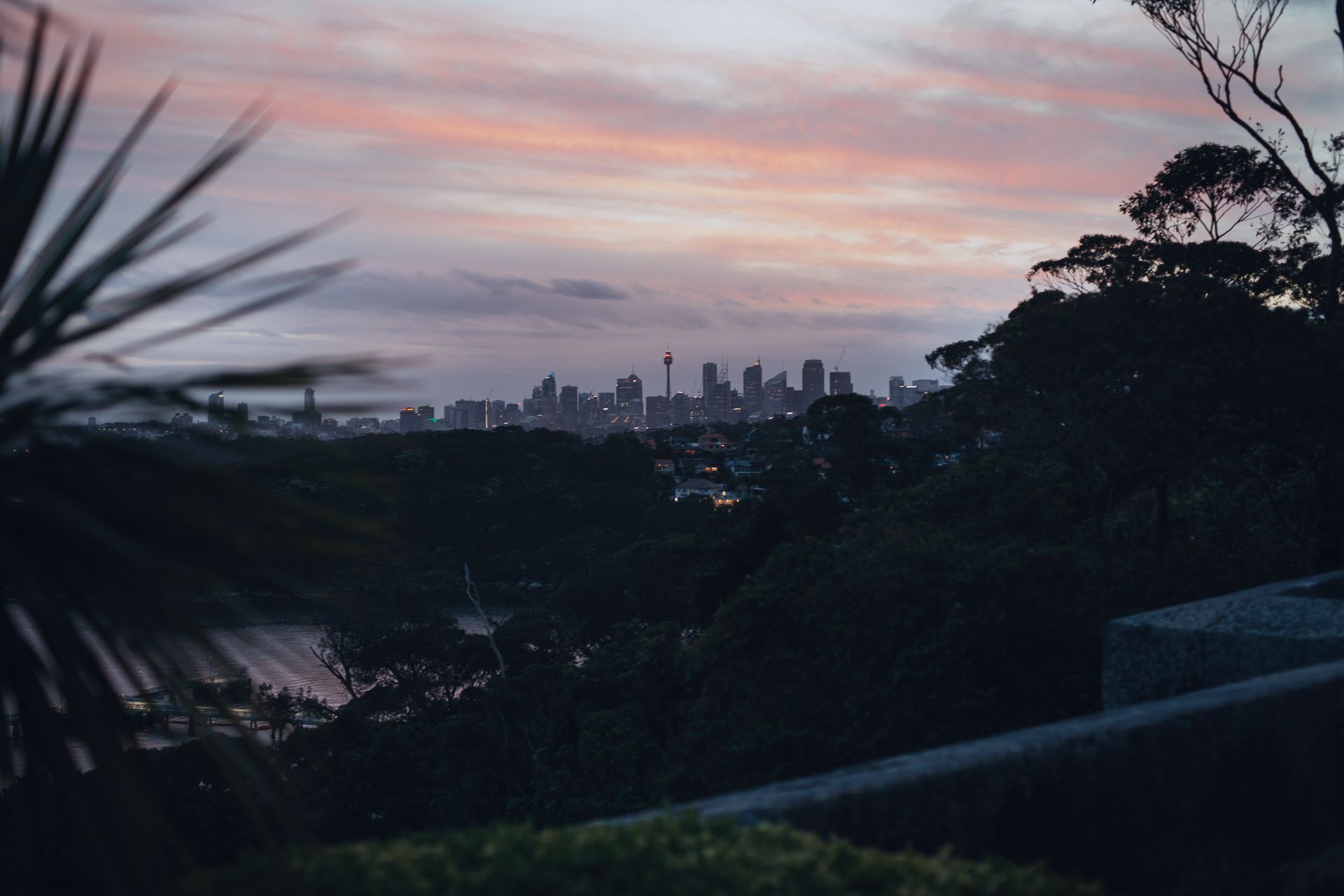 Sydney city skyline at sunset viewed from Gunners' Barracks in Mosman