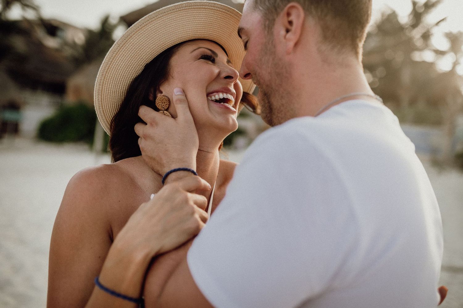 A romantic moment captured between a couple sharing tender moments in a series of wedding photos.
Azulik Tulum