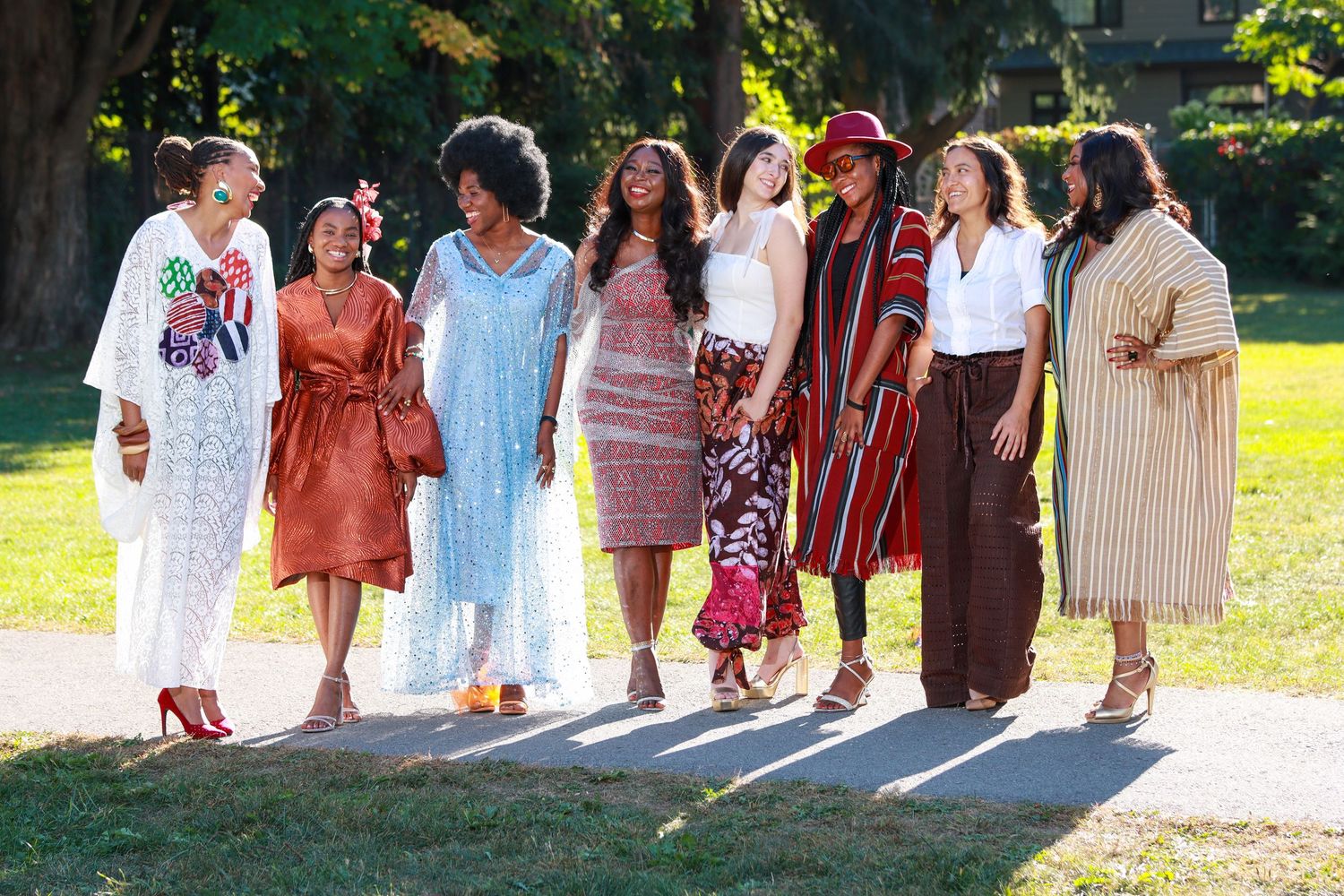 Group of people walking outdoors in casual clothing showing a repeating pattern across connected images.