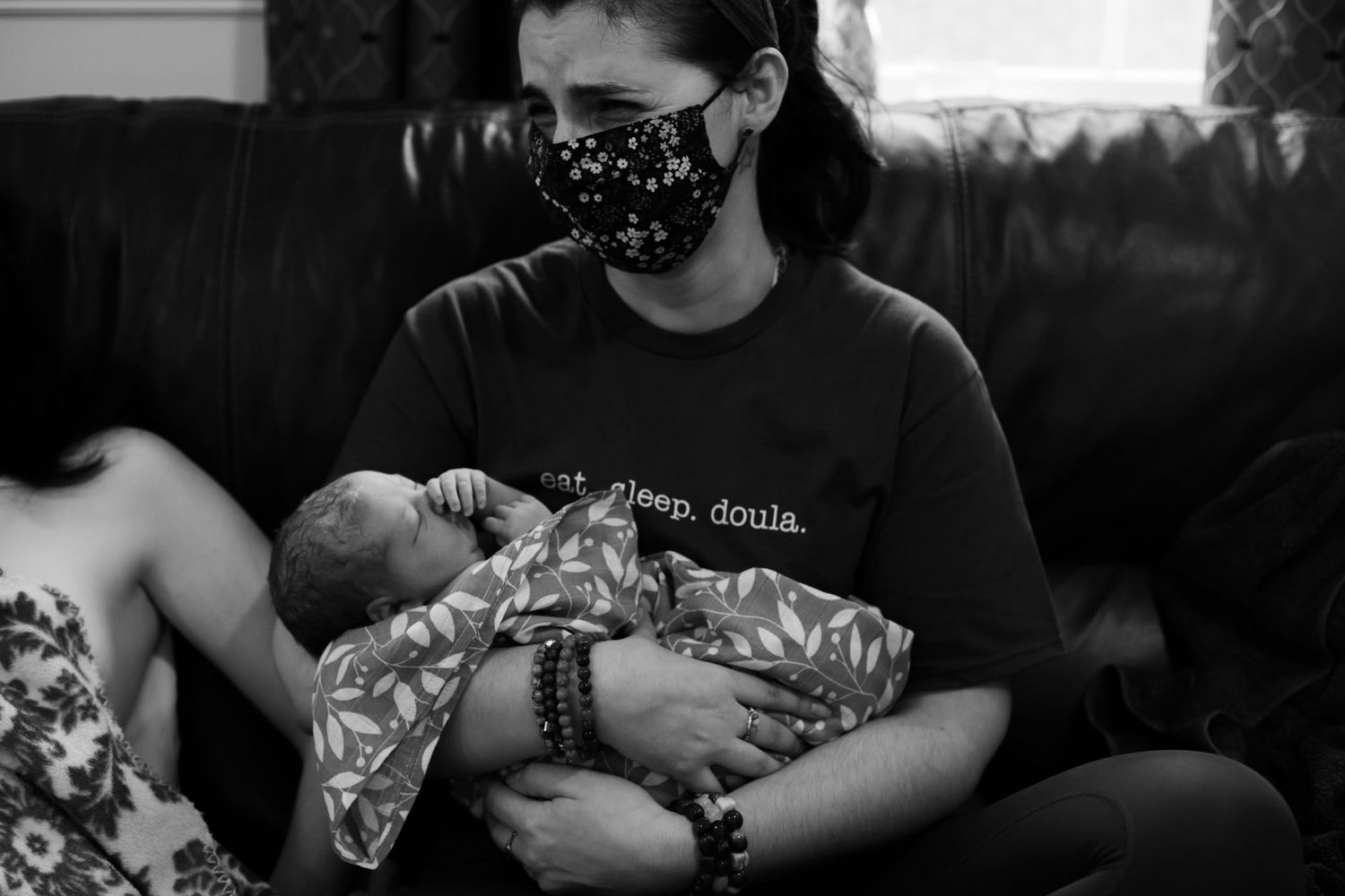 doula work , doula holding baby