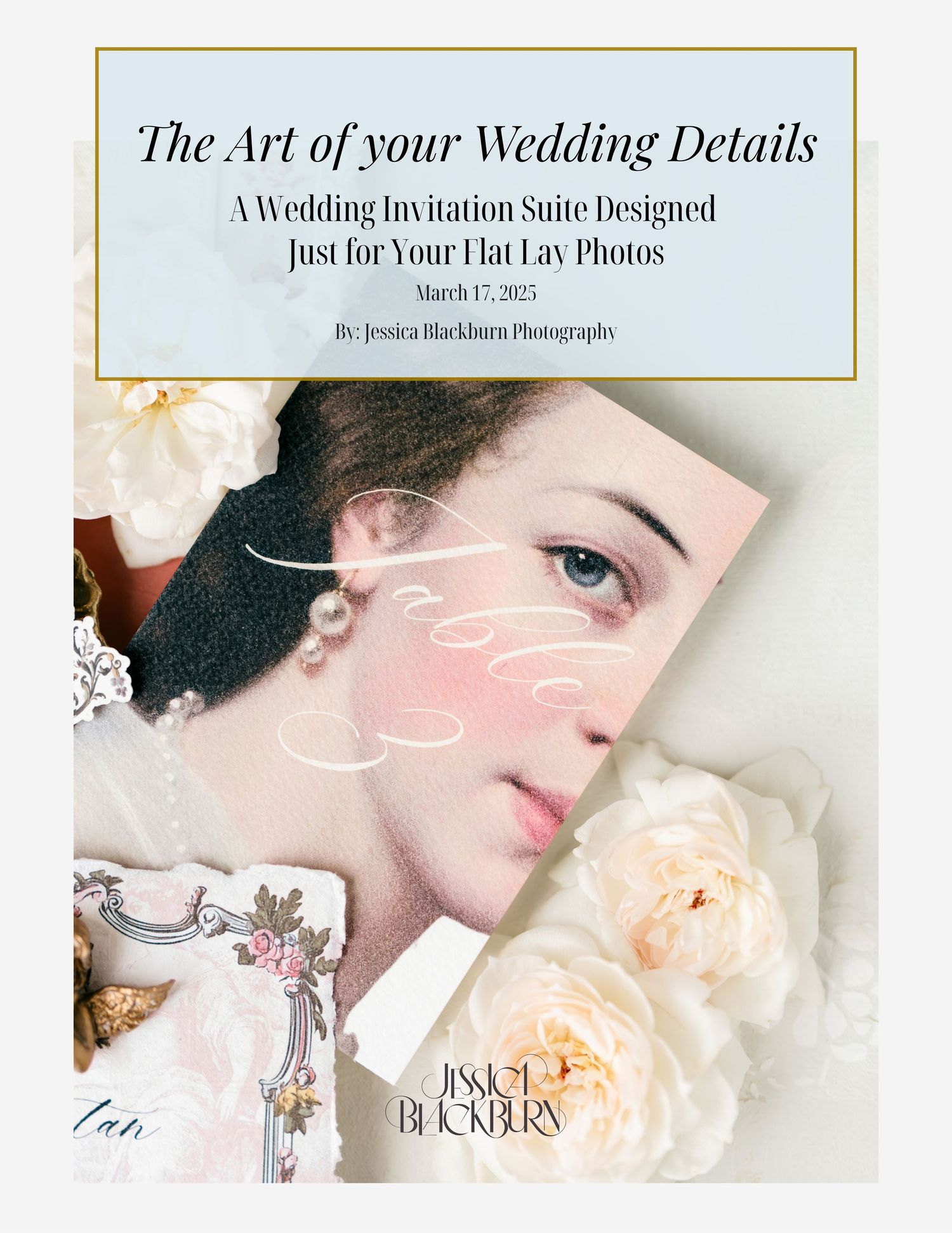 Wedding stationery flatlay with floral invitation suite, vintage keys, blue bird decorations, and white ranunculus flowers.