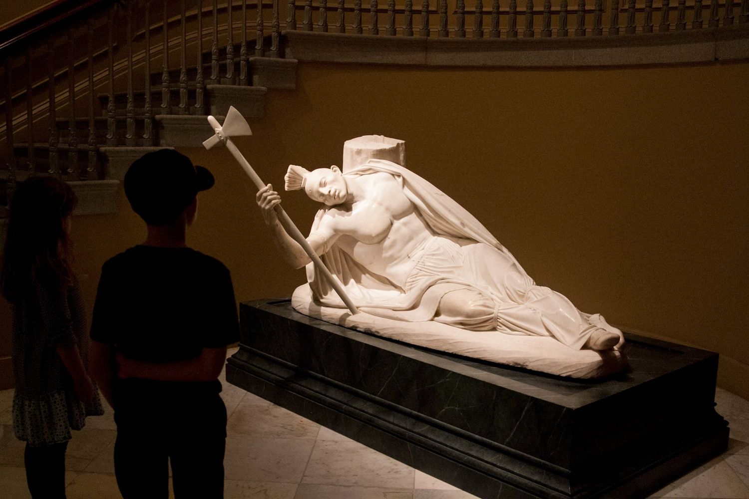 Tecumseh Sculpture with children looking