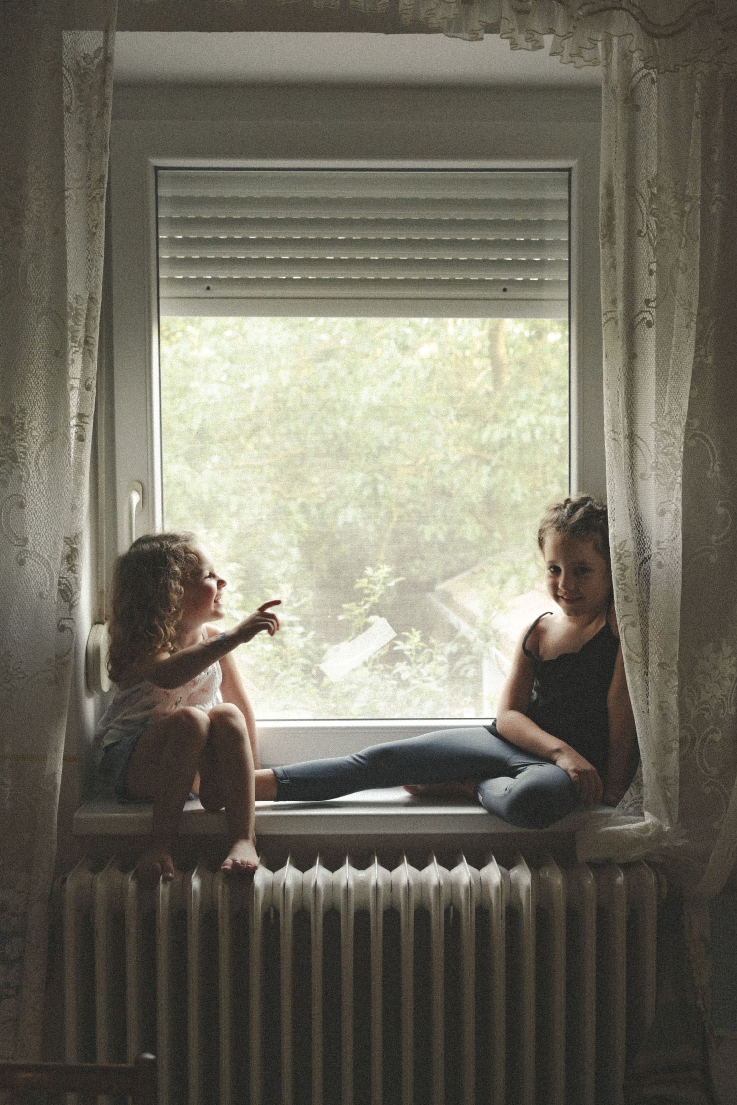 film style vintage photography editing children in window