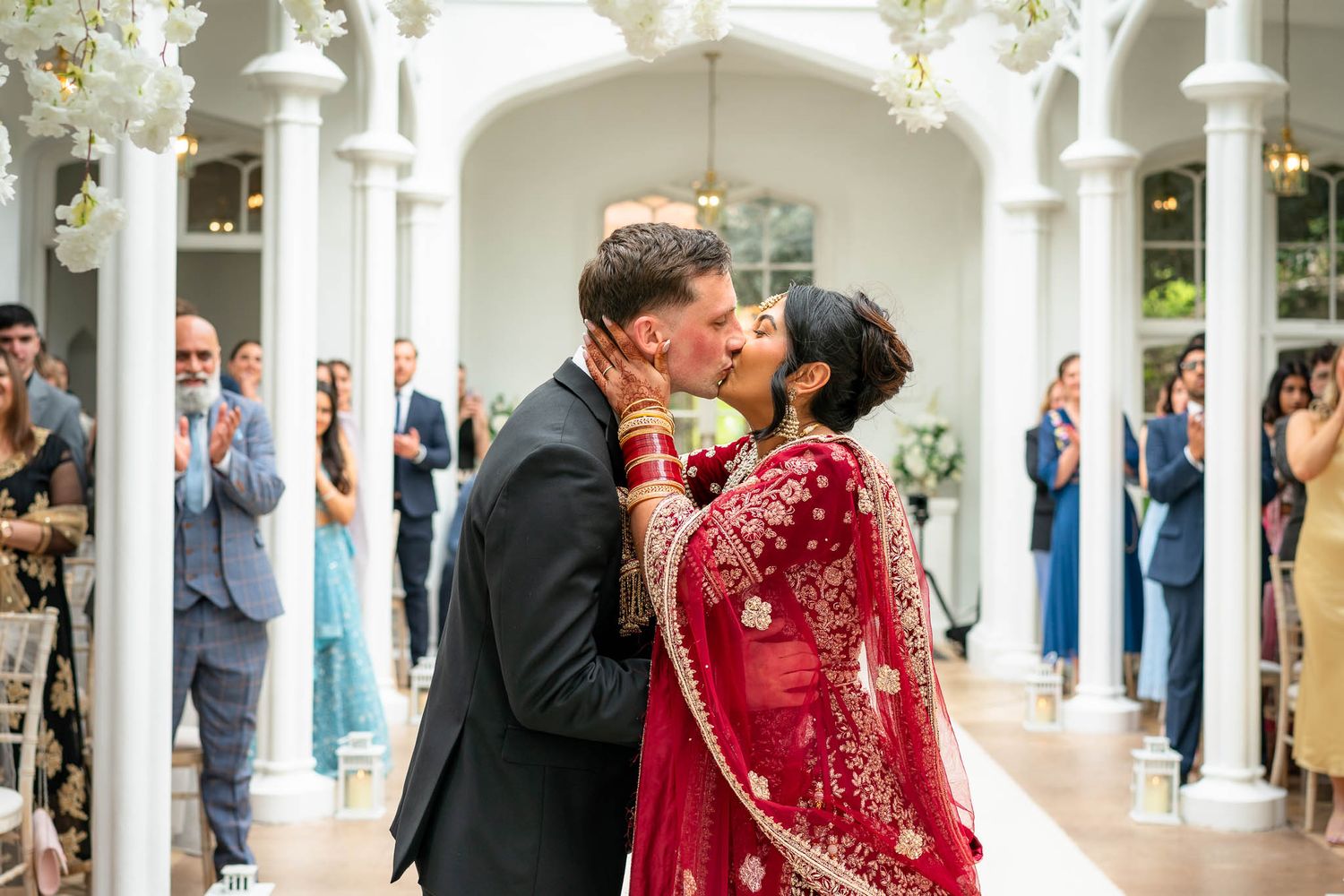 Bride and Groom kissing at their St Audries Park Wedding day ceremony