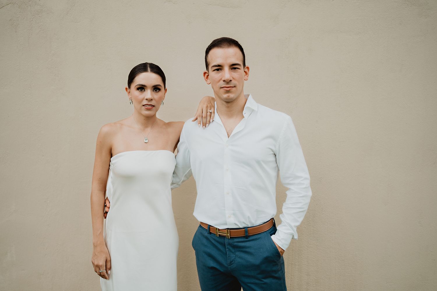 The couple turning to face the camera, editorial style, capturing their connection during the pre-wedding session