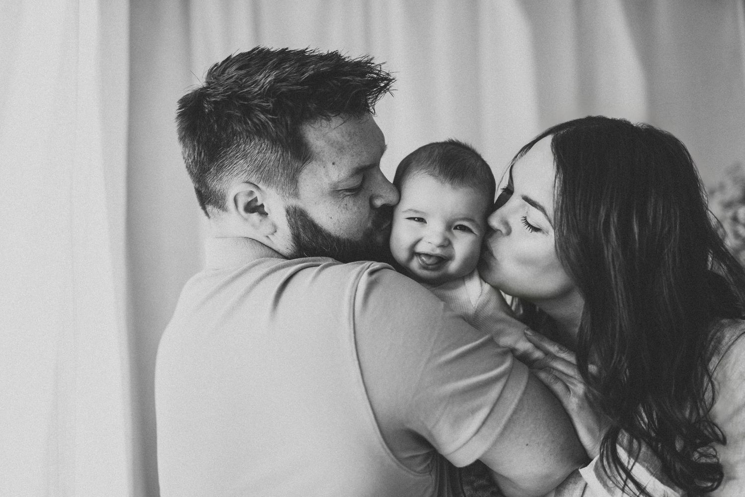 Black and white family photo shoot in photography studio
