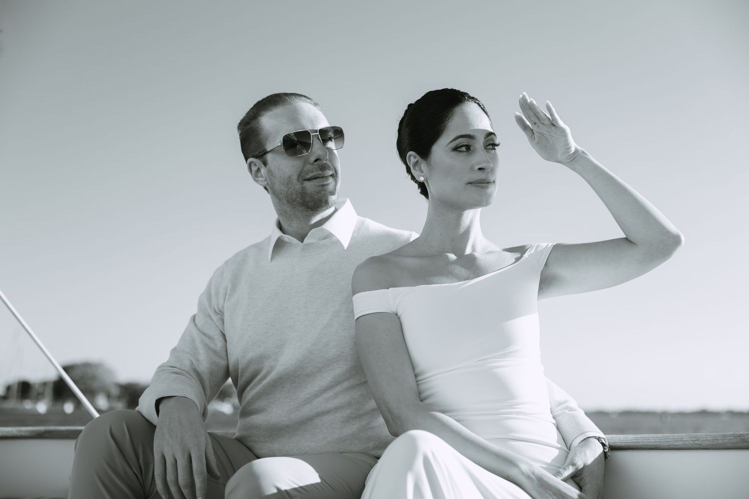 couple on a sailboat for engagement pictures in South Florida
