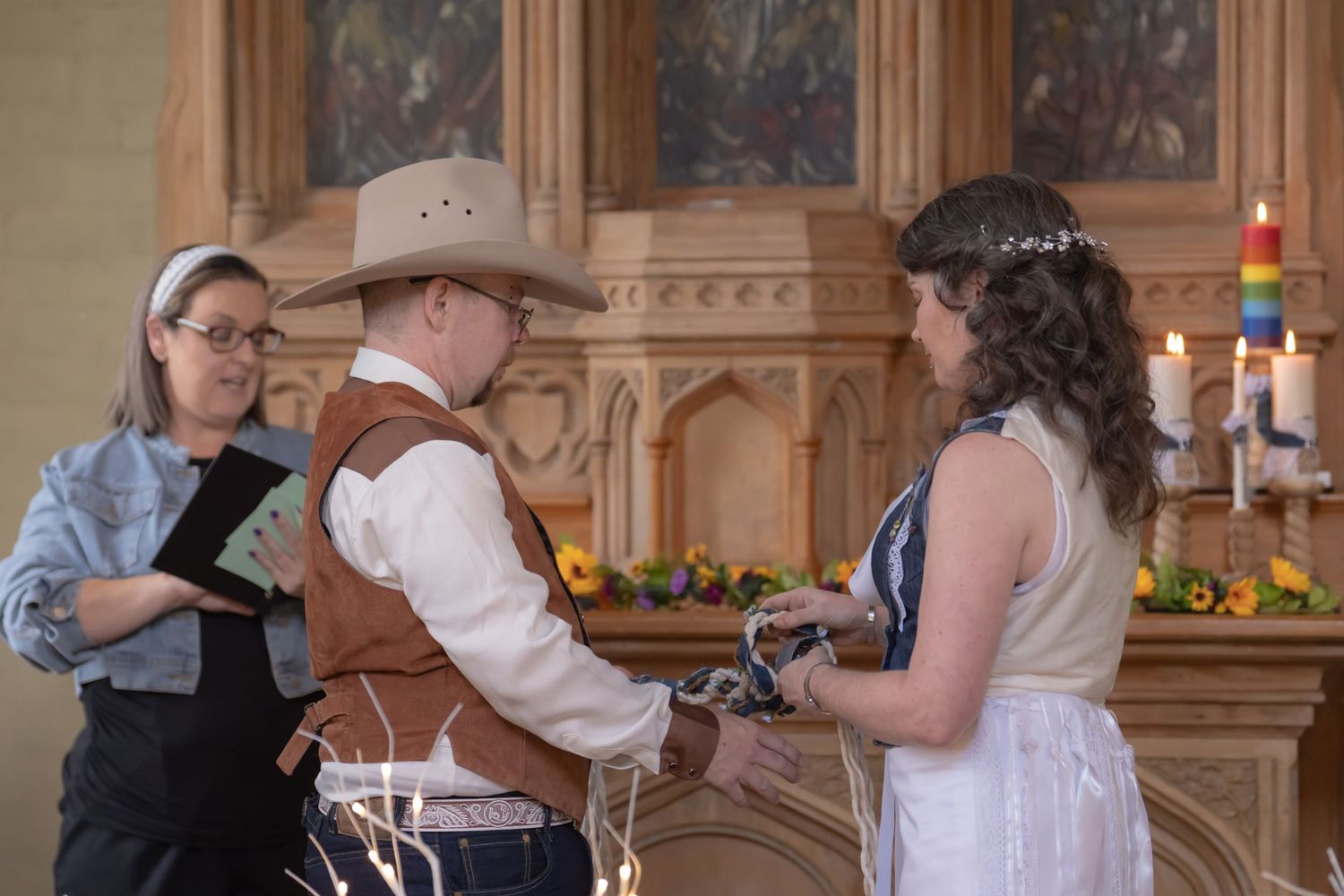 A montage of photos showing a couple getting married in an elegant church setting with stained glass windows and wooden pews.