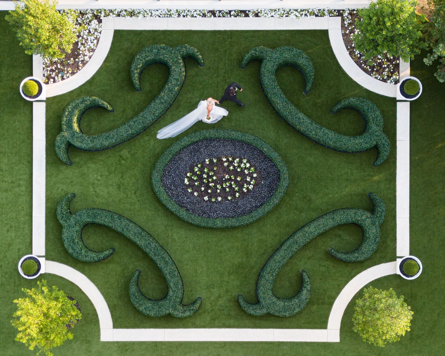 drone photo of a couple in the garden at The Hillside Estate in North Texas