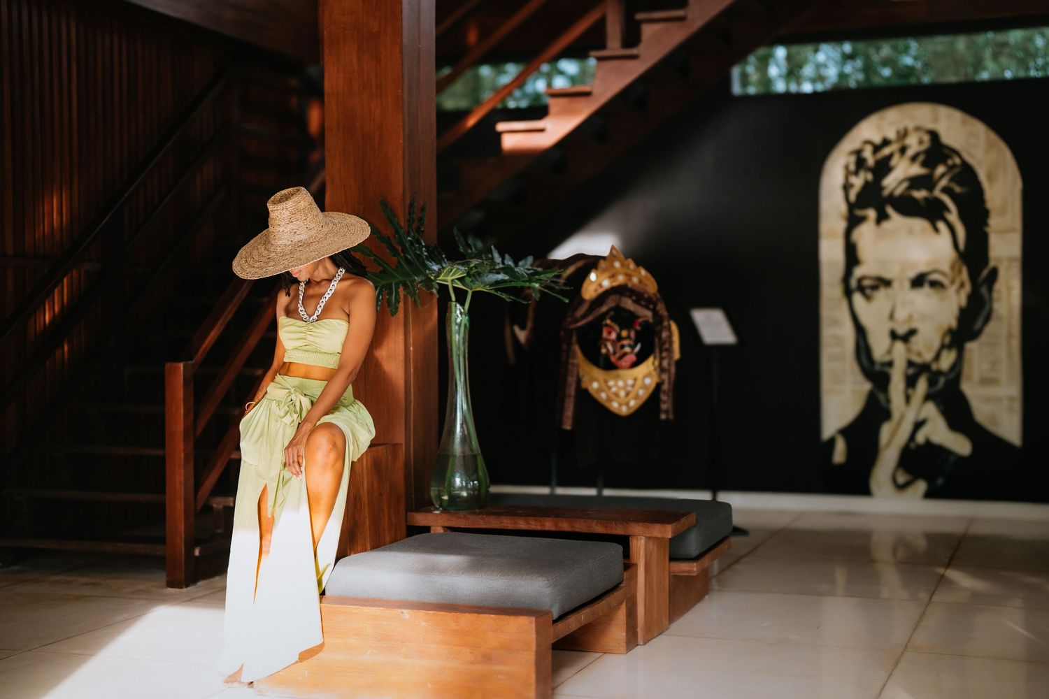 Interior decor featuring artistic cutouts and wall art in modern Asian style.