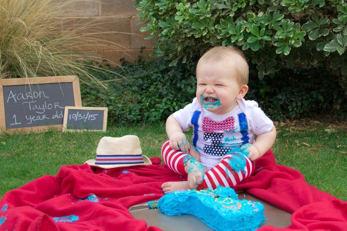 Baby celebrates 1st birthday with cake smash. family photography, graduate sessions, portraits, wedding photography, milestones, kids & pets
