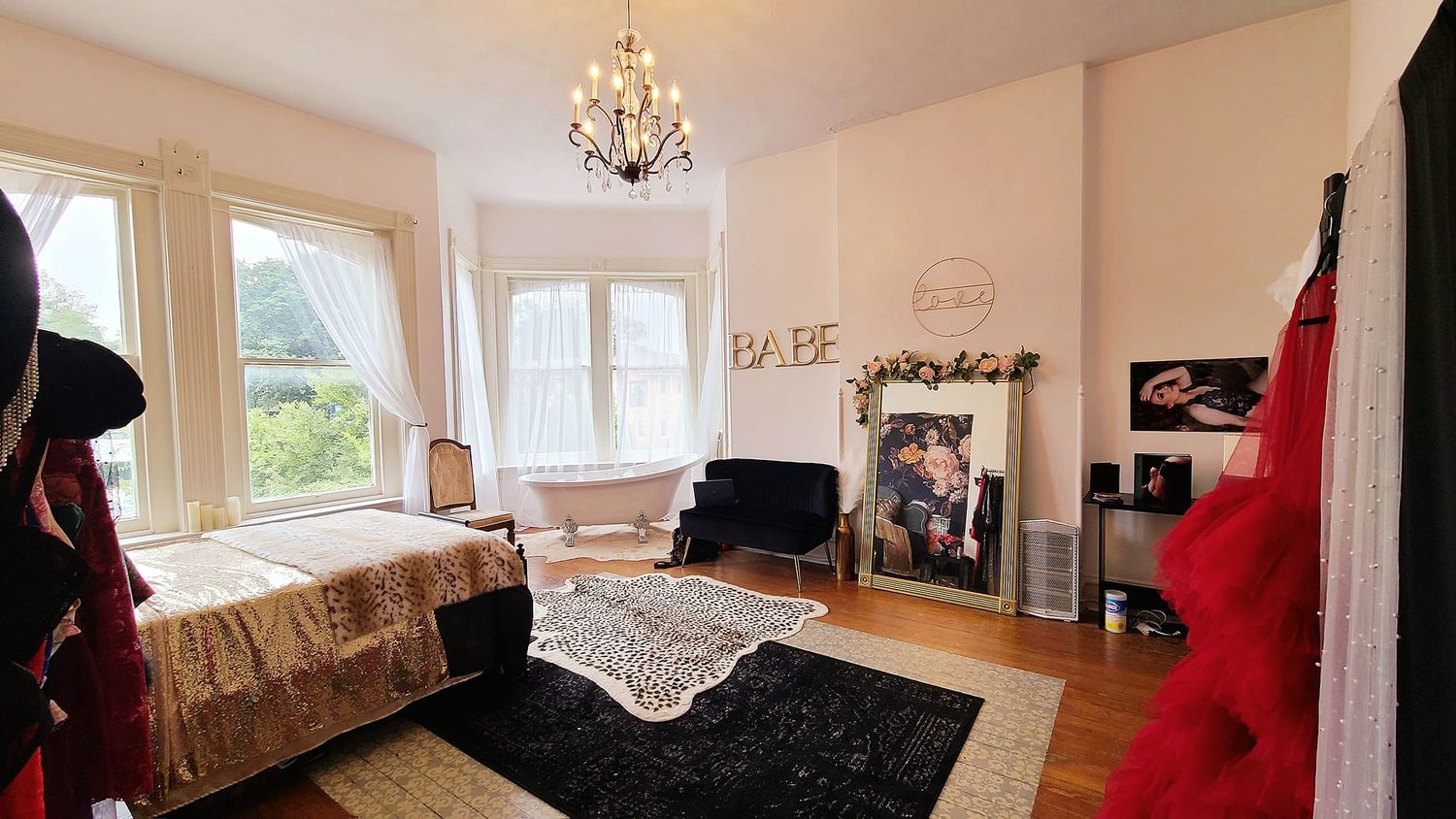 Interior room photo showing chandelier and natural lighting in a spacious setting.