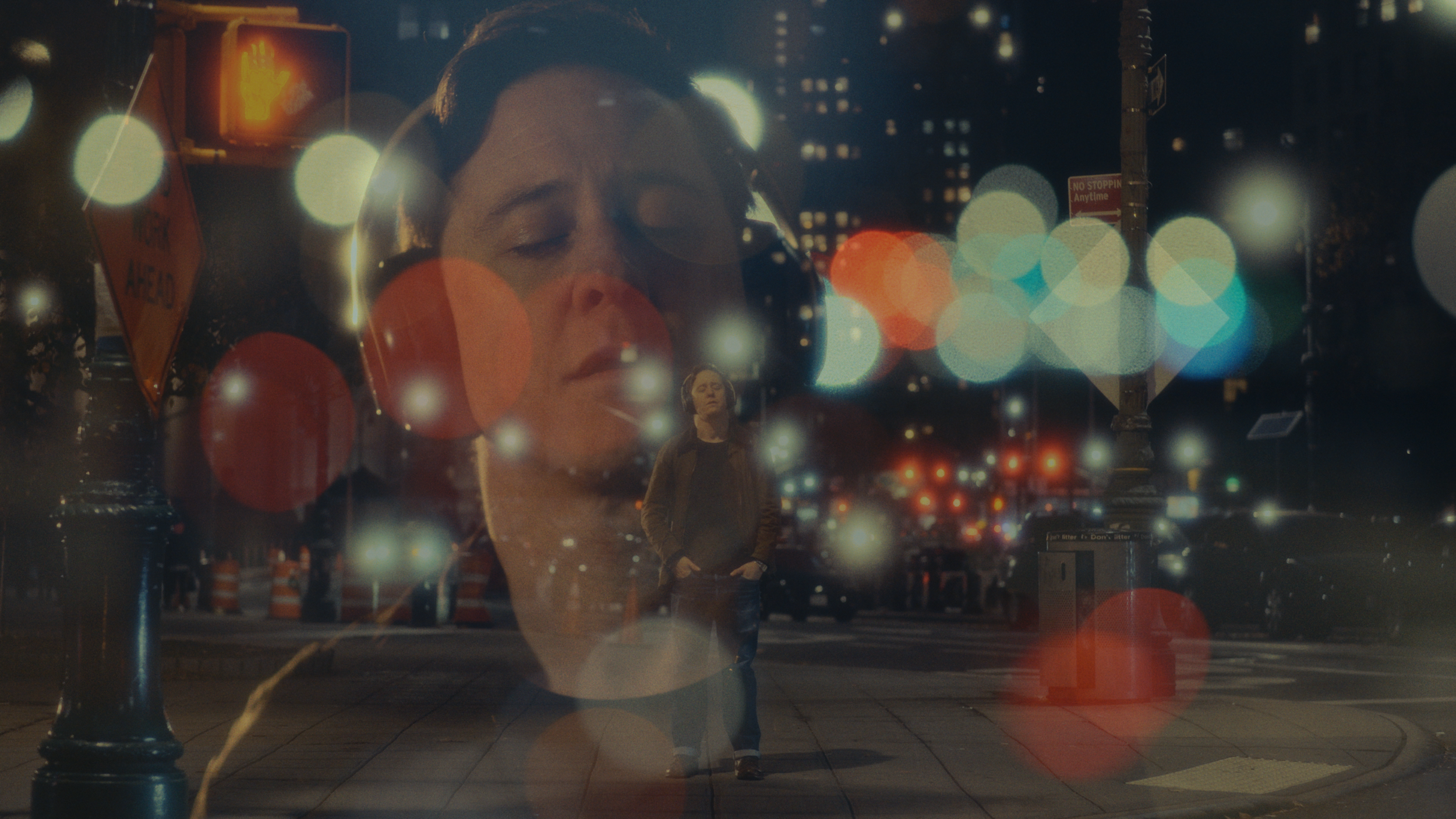Movie title card for 'Liner Notes' showing a person in a beanie against a city skyline.