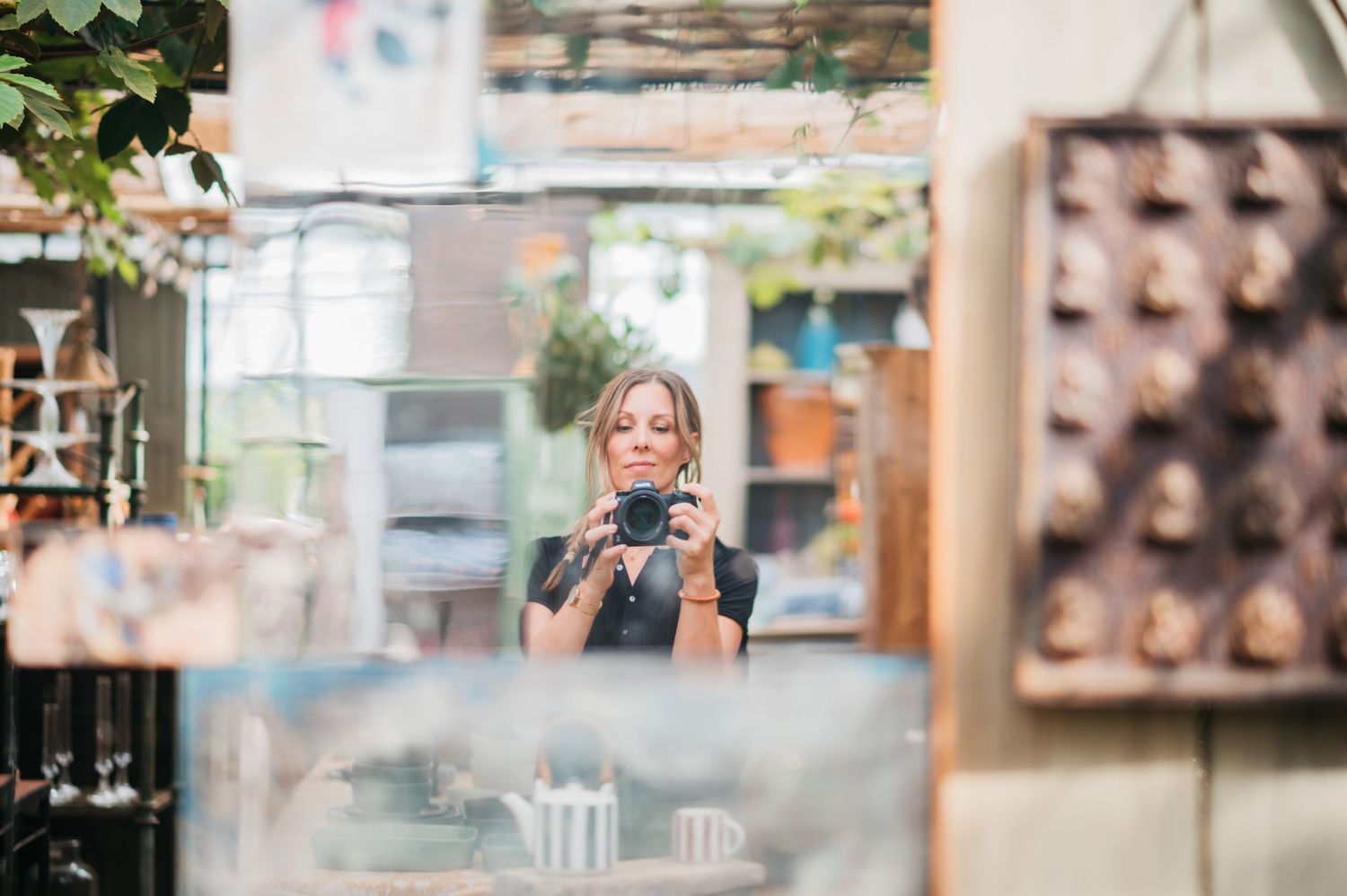 london brand photographer carin thakrar photographing her reflection in a mirror
